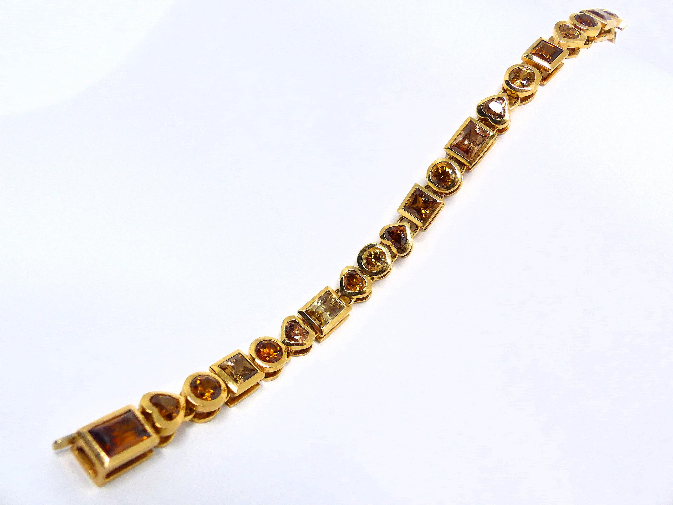 Armband aus Roségold mit 20 braunen Zirkonen in verschiedenen Formen und Farben. (Zeitgenössisch) im Angebot