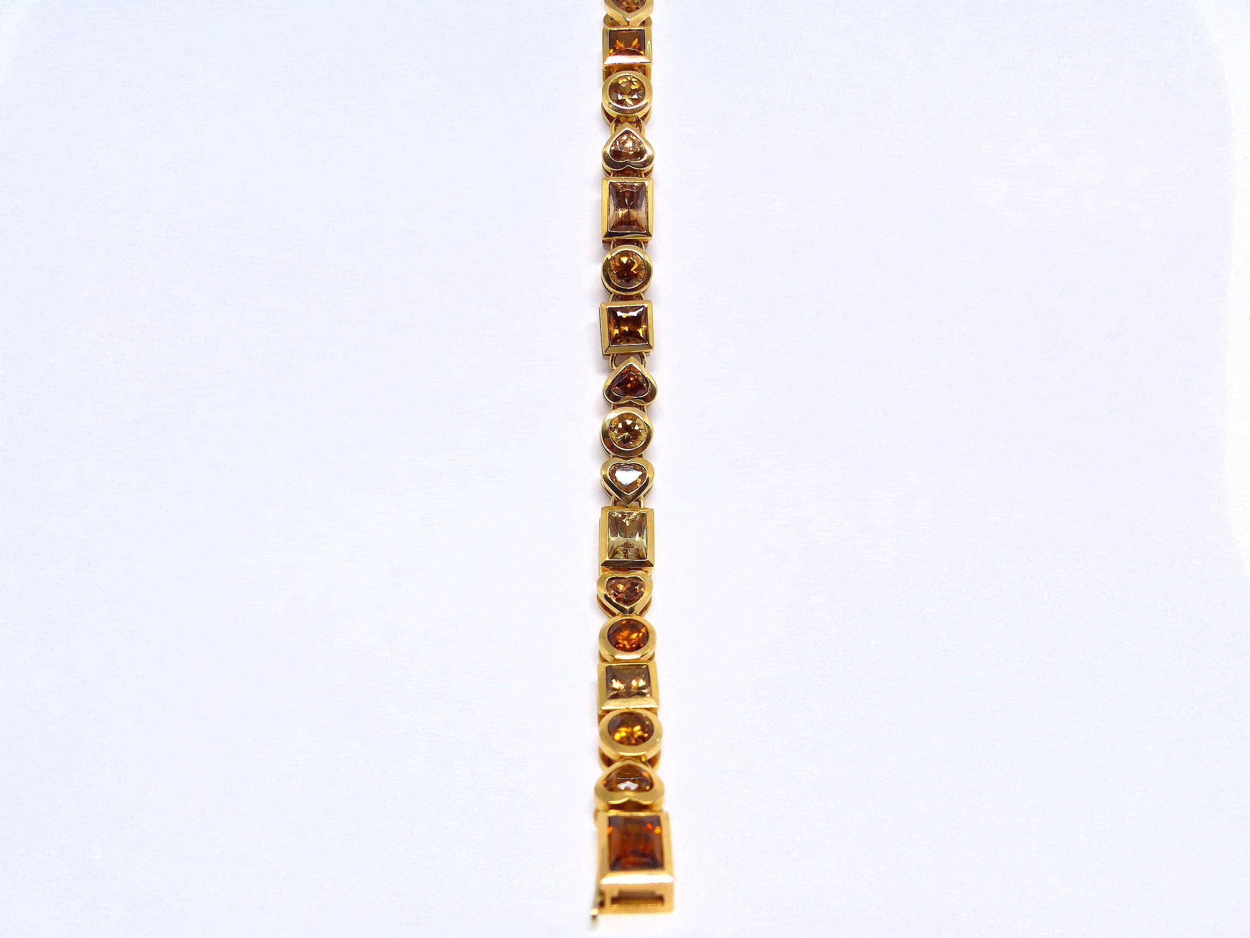 Armband aus Roségold mit 20 braunen Zirkonen in verschiedenen Formen und Farben. (Carréschliff) im Angebot