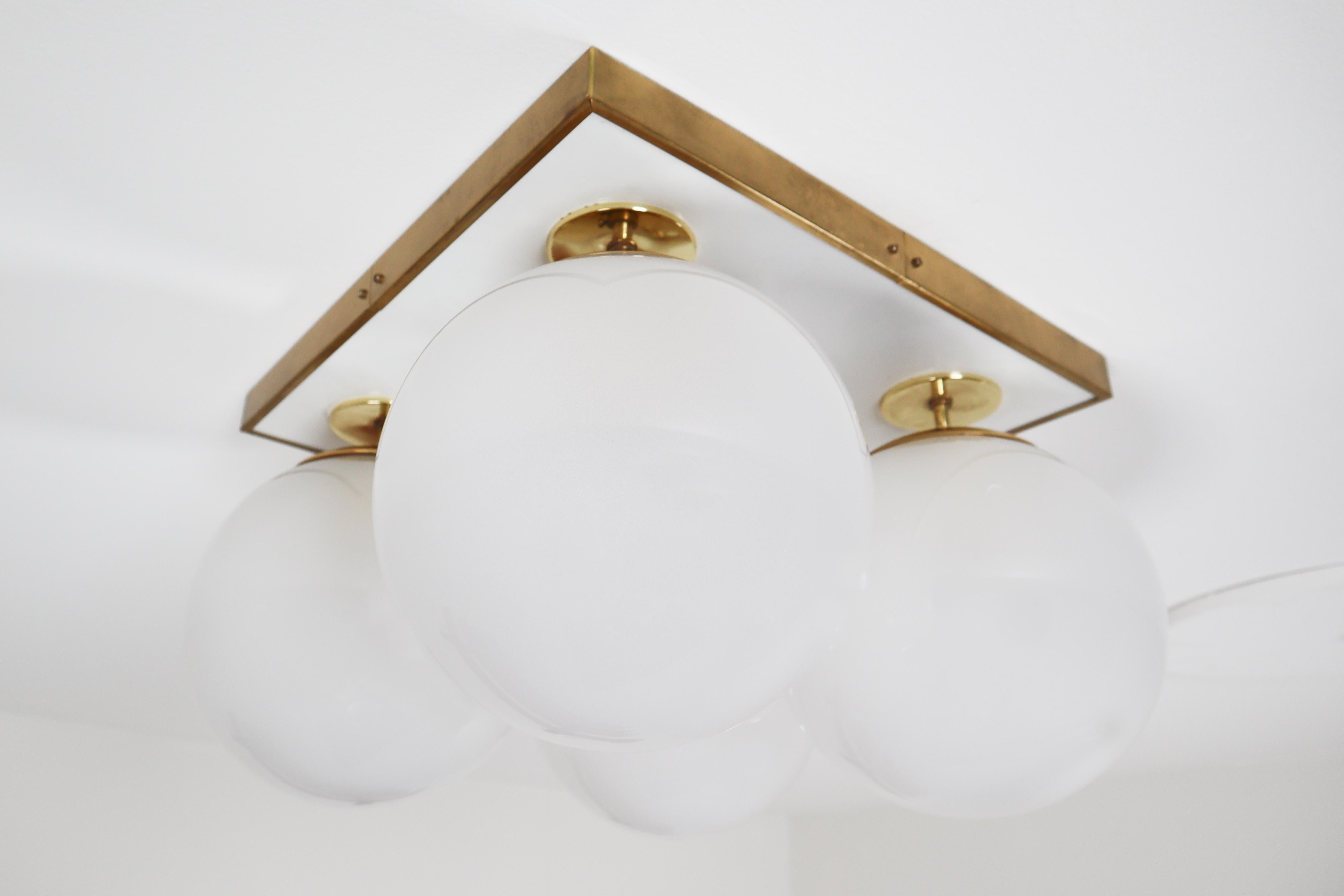 Mid-Century Modern Brass Ceiling Chandeliers with Four Pearl White Glass Globes For Sale 7