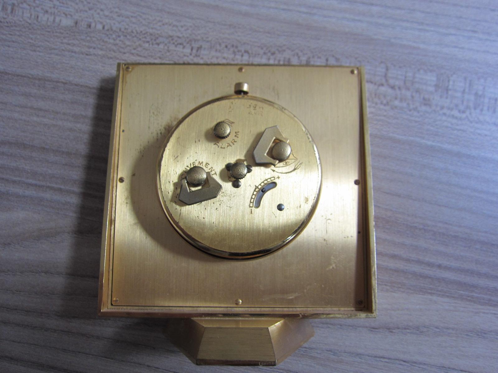 Mid Century Looping Table Clock with alarm , good condition, 1960.