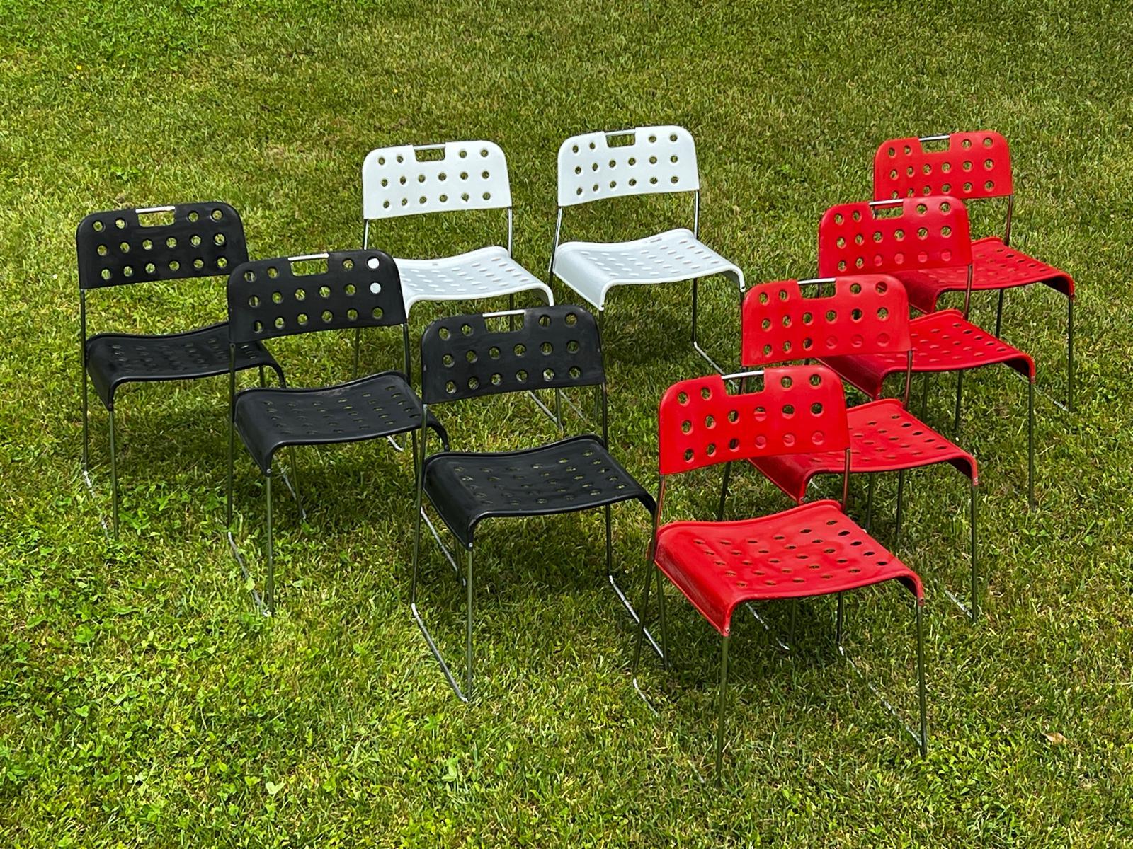 Mid-Century Modern Omstak chairs by Rodney Kinsman for Bieffeplast, 1960
Rodney Kinsman's ''Omstak'' chair produced by Bieffeplast in the 1960s in Italy.
Seat and back in lacquered and perforated metal fixed to a steel frame.
4 red and 3black  and 2