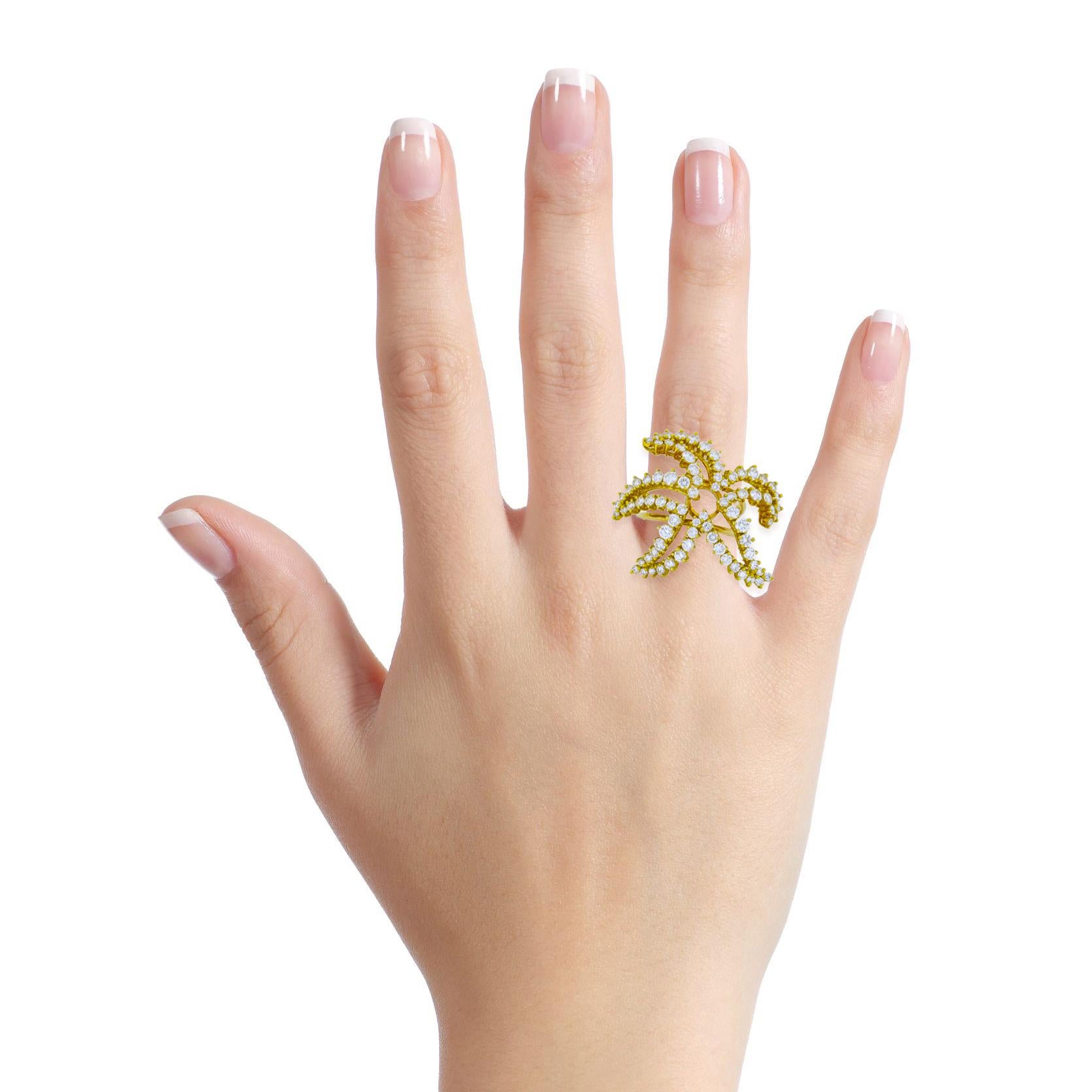 Diamond starfish ring crafted om 18-karat yellow gold. The ring is prong set with 80 round cut natural diamonds. 

Size, 10
Length, 40mm
Width, 32mm
Depth, 4mm
Weight, 15.6 grams
Diamond Color and Clarity, G - VS
Diamond Total Carat Weight, 2.00