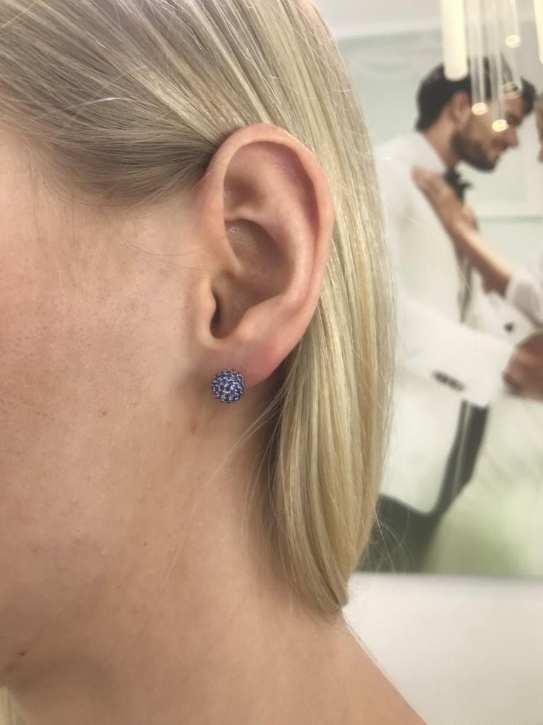 These Beautiful 2.00 Carat Blue Sapphire Pave Set Diamond stud Earrings like the color of the ocean are perfectly set in 18 Karat White Gold. Suitable for any occasion these earrings are the perfect pair. British Hallmarked. 