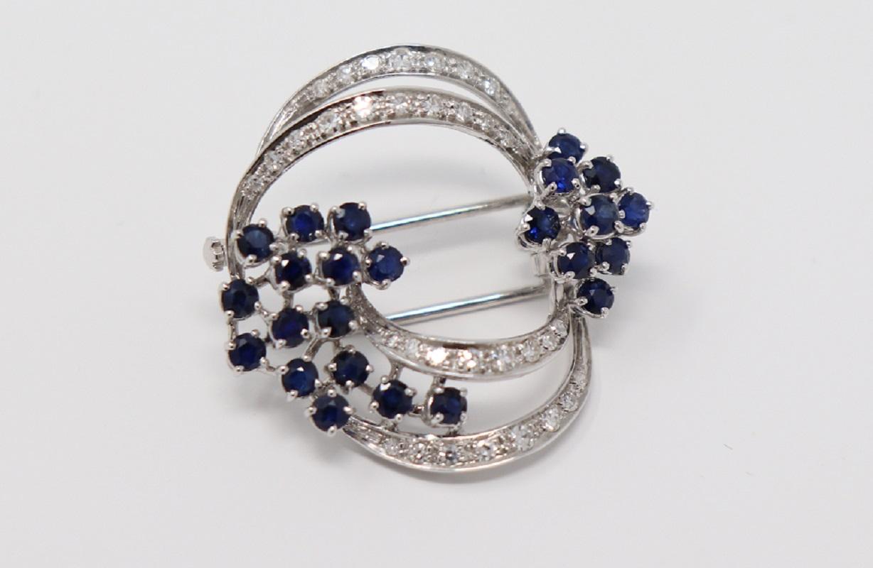 Women's 2.00 Carat Blue Sapphire and 0.45 Carat Diamonds White Gold Brooche For Sale