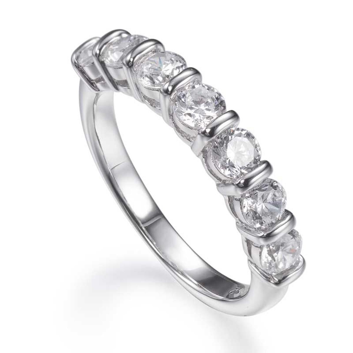Introducing our exquisite Seen Stone 2.00ct Cubic Zirconia Half Eternity Ring, a captivating statement of sophistication and style. This stunning piece boasts seven brilliant-cut cubic zirconias, totaling 2.00ct, skillfully encased in an invisible