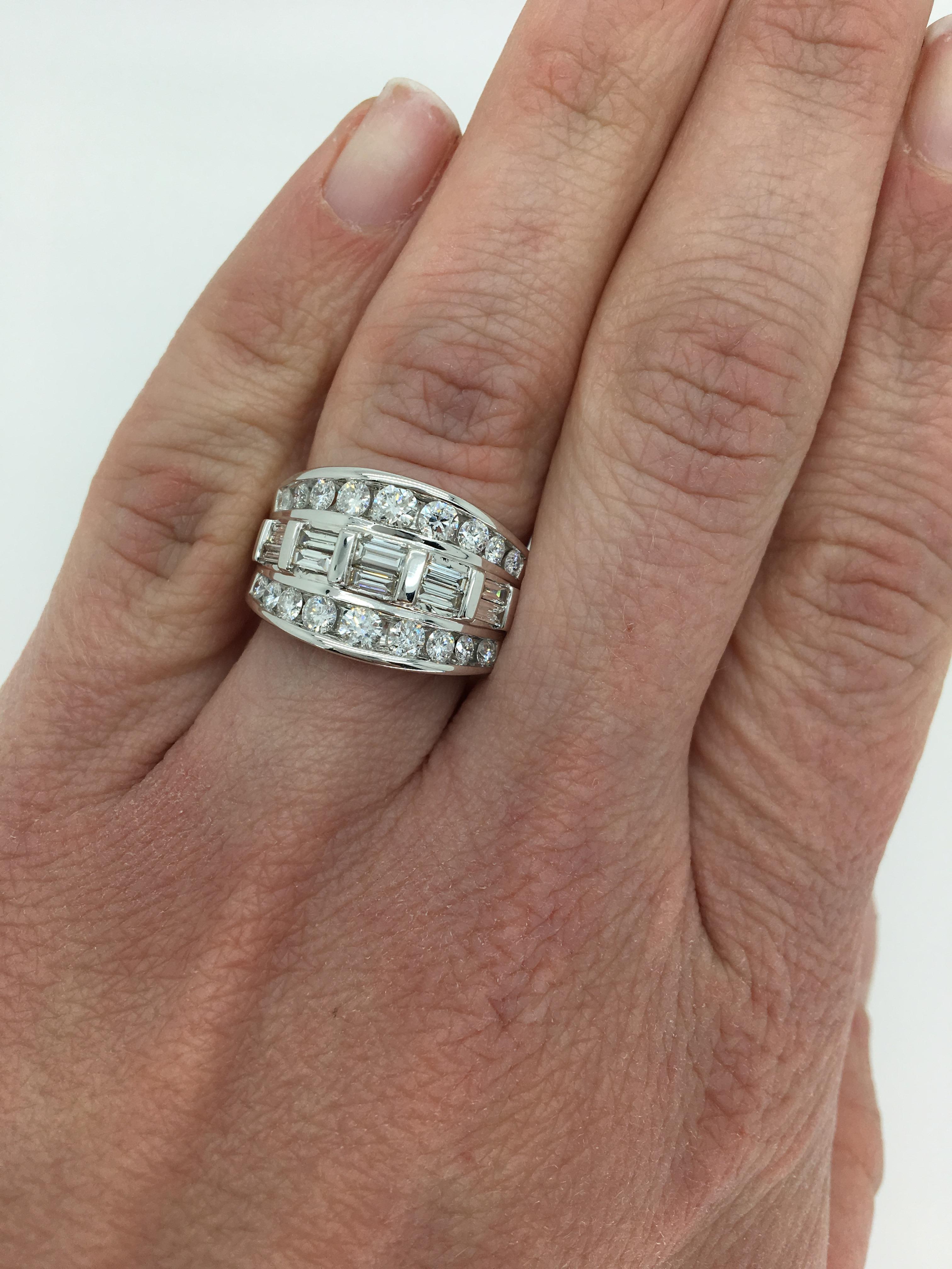 Approximately 2.00CTW Baguette Cut and Round Brilliant Cut diamond ring set in 14k white gold.

 
Diamond Cut: 10 Baguette Cut Diamonds and 12 Round Brilliant Cut Diamonds
Average Diamond Color: G-H
Average Diamond Clarity:  VS-SI
Diamond Carat