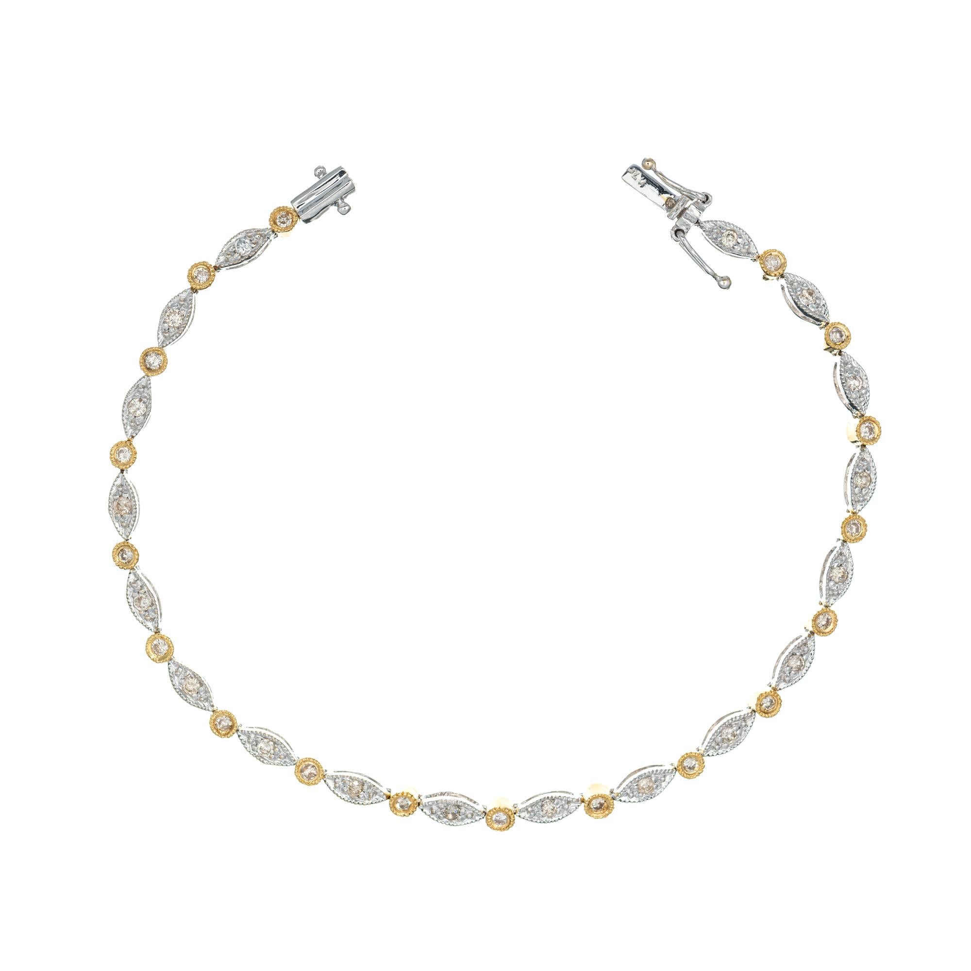 Necklace and or bracelet diamond set. 120 brilliant cut diamonds in 18k white gold marquise and yellow gold tubes sections. This versatile piece can be worn as a 17 inch necklace and 7 inch matching bracelet or attached together to make a 24 inch