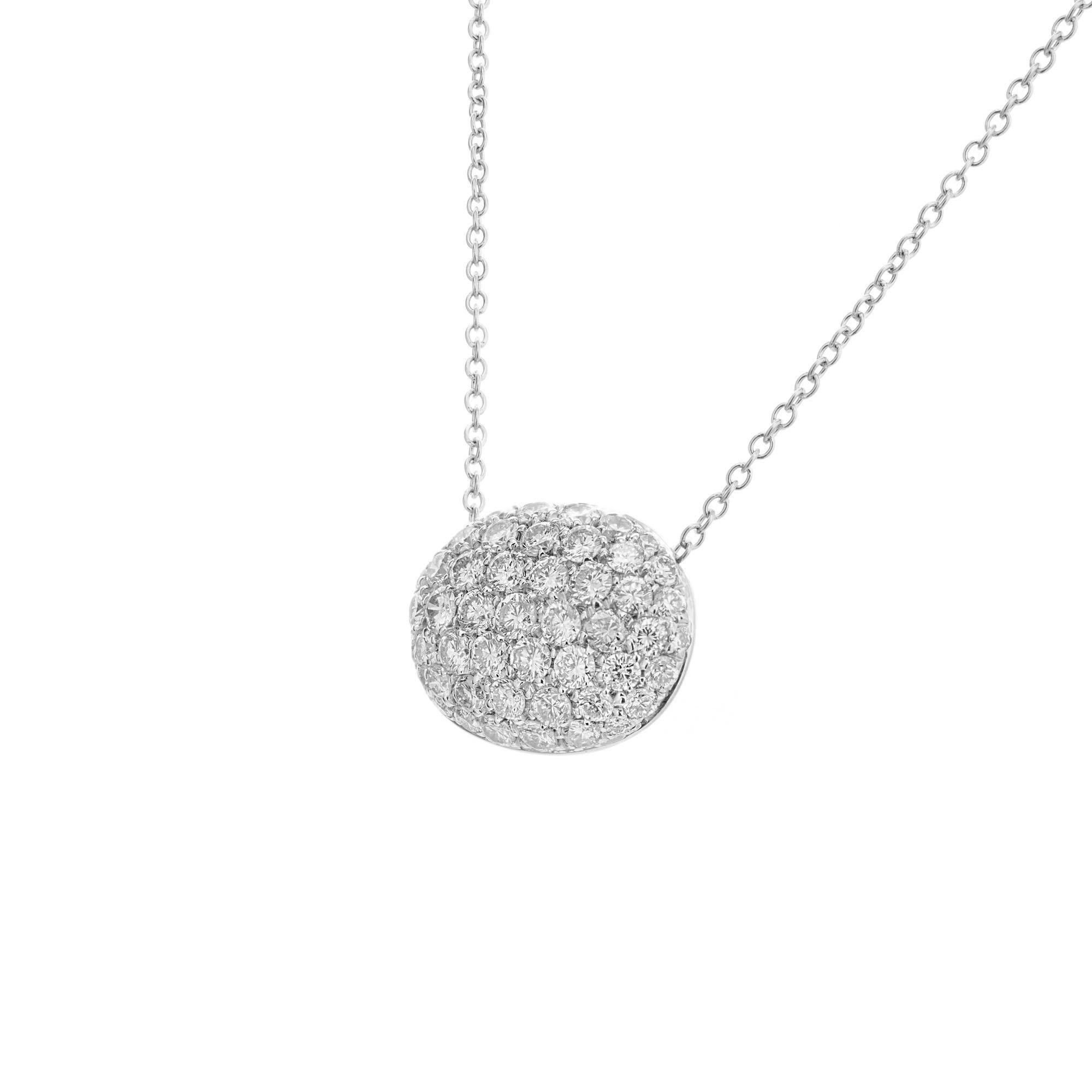 Diamond pendant necklace. 51 round pave diamond cluster domed over pendant. 18k white and yellow gold.  16 inch white gold chain. 

51 round brilliant cut diamonds, G VS approx. 2.00cts
18k yellow gold 
18k white gold 
Stamped: 750
5.6 grams
Top to