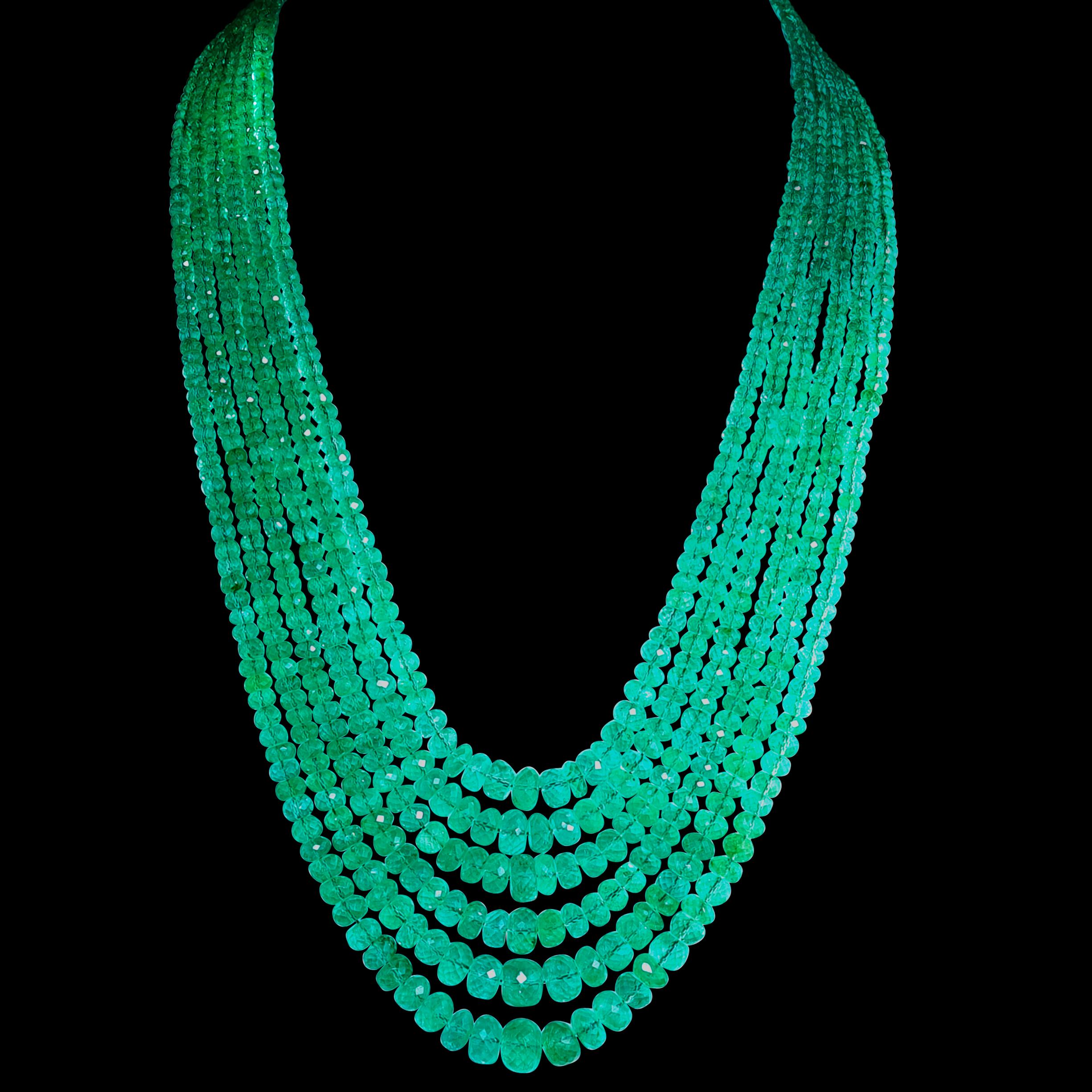 MAKE LISTING
200 Carat  Emerald Beads 7 Line  Necklace With Diamond Clasp 18 Kt Yellow Gold 
This spectacular Necklace   consisting of approximately 200 Ct  of fine beads.
 There are 7 rows of fine Emerald Beads  
Total carat weight of diamonds  is