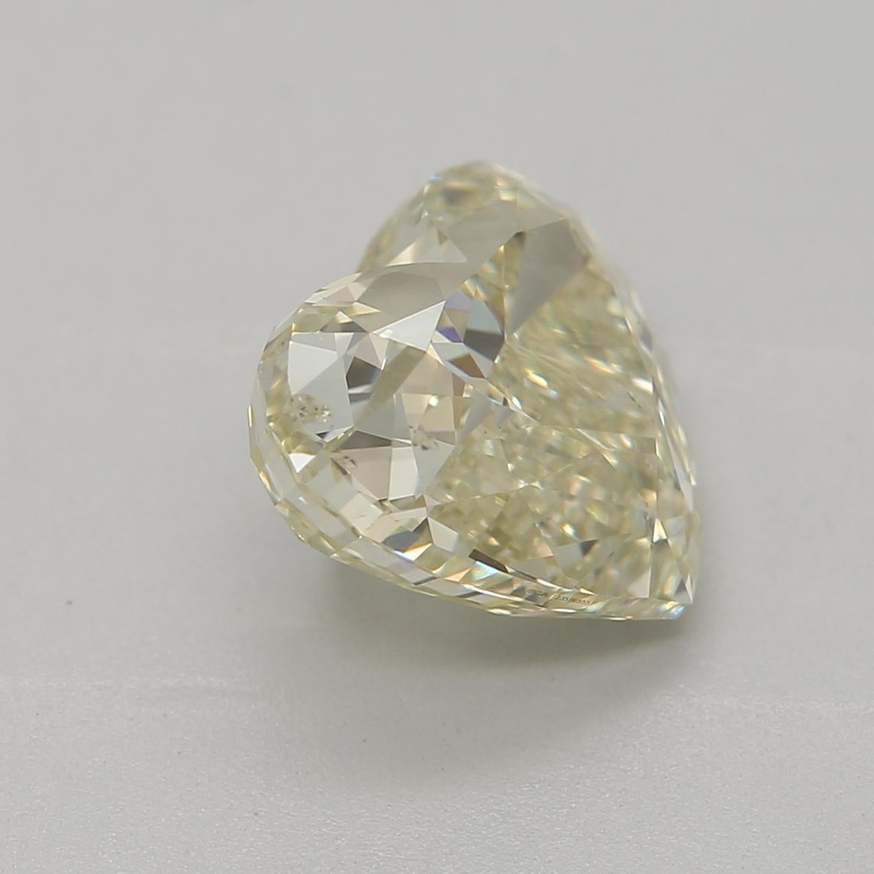 Women's or Men's 2.00 Carat Fancy Light Brownish Greenish Yellow Heart cut diamond GIA Certified For Sale