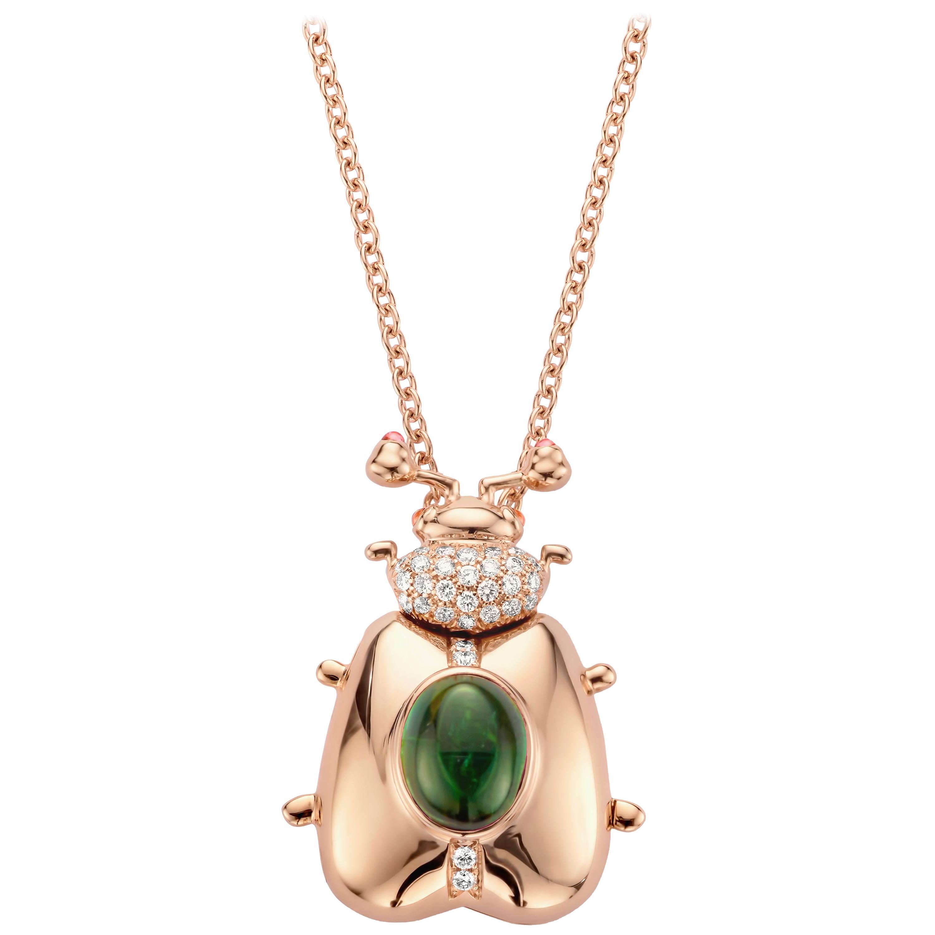 One of a kind lucky beetle necklace in 18 Karat rose gold 16g set with the finest diamonds in brilliant cut 0,31Ct (VVS/DEF quality) and one natural, green tourmaline in oval cabochon cut 2,00Ct. 

The feelers and the eyes of this beautiful golden