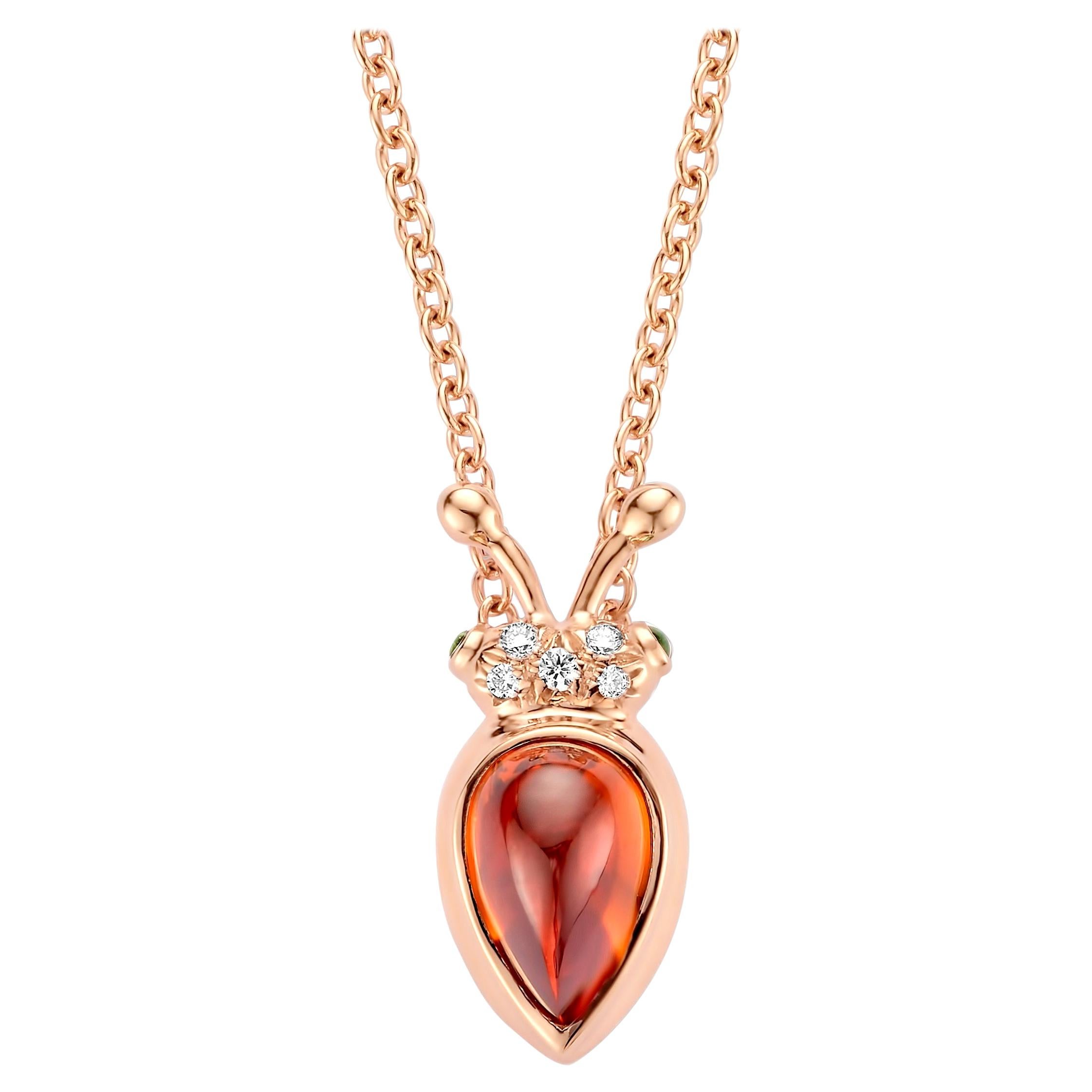 One of a kind lucky beetle necklace in 18K rose gold 6g created by jewelry designer Celine Roelens. This necklace is set with the finest diamonds in brilliant cut 0,04Ct (VVS/DEF quality) and one natural, mandarin  garnet in pear cabouchon cut