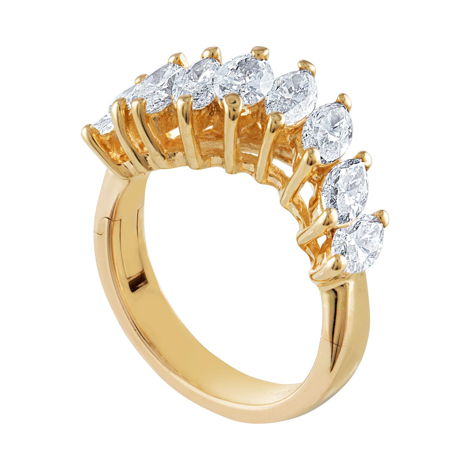 Nine-Stone Wave Half Band Ring
The ring is 14K Yellow Gold
There are 2.00 Carats Diamonds F VVS
The ring is a size 6.75, sizable.
This is a Superfit® shank
The side unhinges so you can slip the ring on.
Wonderful solution for anyone who has