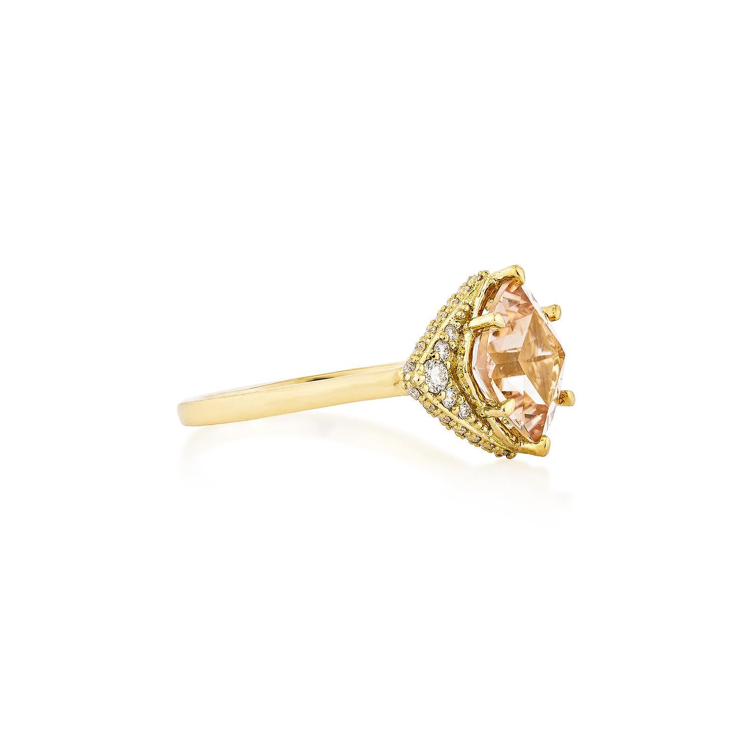 This collection includes a range of Morganite, which is a symbol of love and relationships, making it an excellent choice for a variety of applications. Accented with White Diamonds this ring is made in Yellow Gold and present a classic yet elegant