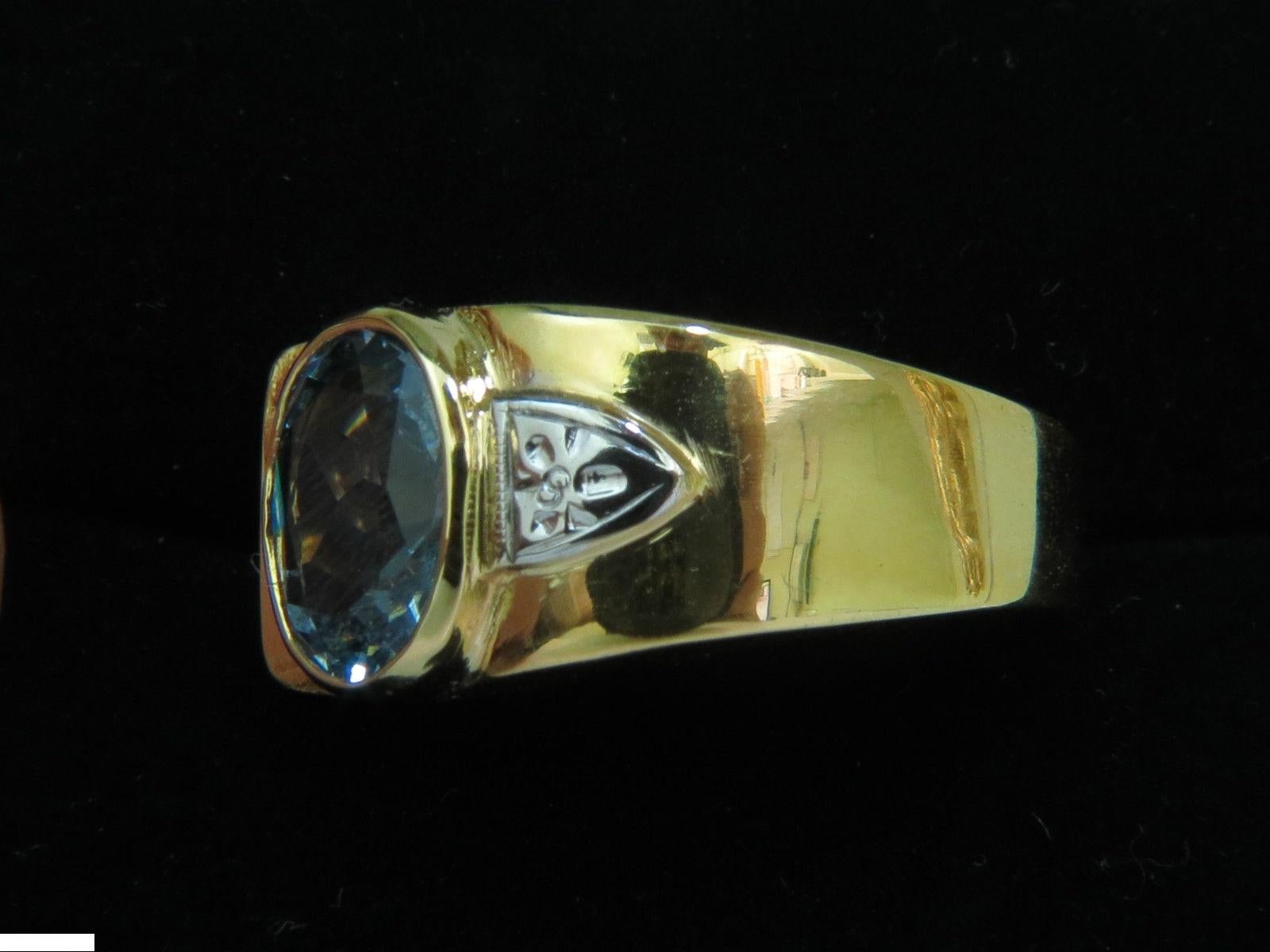 2.00ct Natural Aquamarine
Oval Brilliant

Transparent

Si-2 clarity

(aquamarine has needle lines inclusions)

Classic Aqua blue color

9.5 X 8mm

14kt. yellow gold

6.8 grams

$1500 Appraisal to accompany 

Current size: 9 and can be resized 

Ring