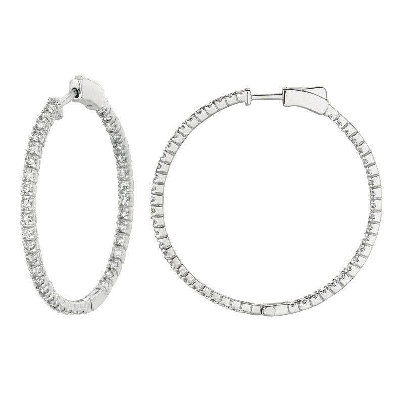 2.00 Carat Natural Diamond Hoop Earrings G SI 14K White Gold

100% Natural, Not Enhanced in any way Round Cut Diamond Earrings
2.00CT 
G-H 
SI  
14K White Gold,  6.8 grams,  Prong Style
1 5/8 inch in height, 1/16 inch in width
100 diamonds