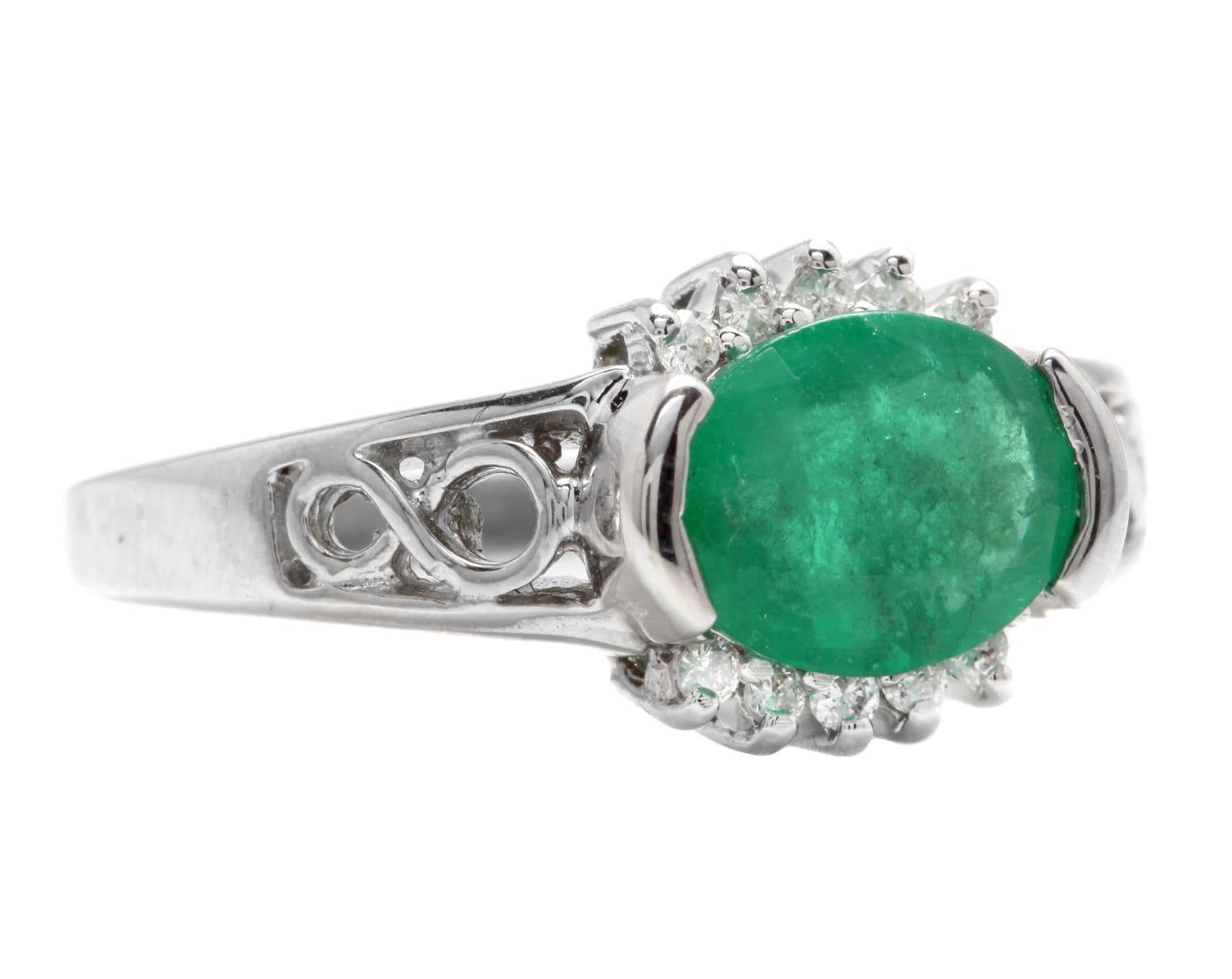 2.00 Carats Natural Emerald and Diamond 14K Solid White Gold Ring

Suggested Replacement Value: Approx. $5,000.00

Total Natural Green Emerald Weight is: Approx. 1.80 Carats

Emerald Measures: Approx. 9 x 7mm

Natural Round Diamonds Weight: Approx.
