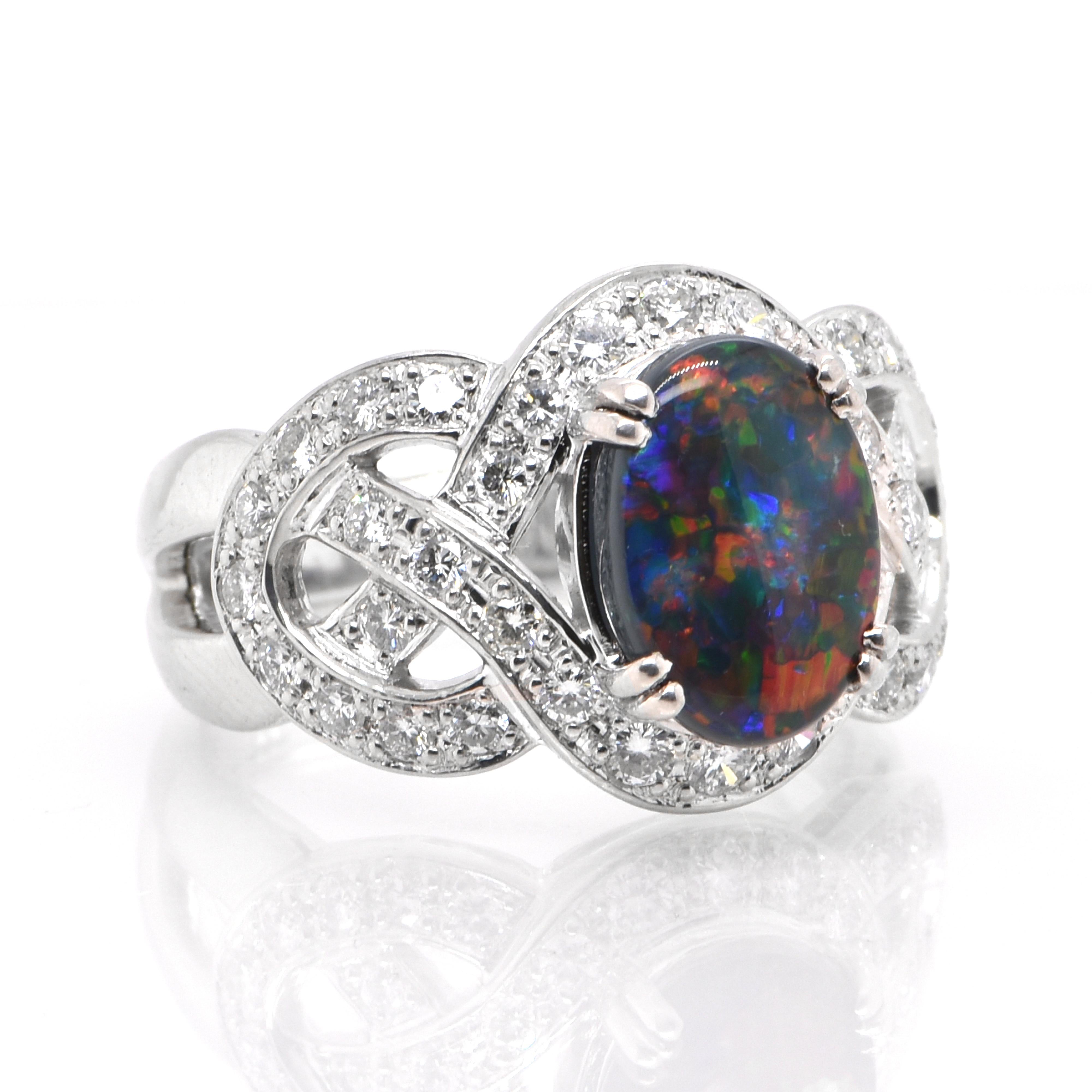 Modern 2.00 Carat Natural Lighting Ridge Black Opal and Diamond Ring Set in Platinum For Sale