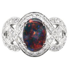 Vintage 2.00 Carat Natural Lighting Ridge Black Opal and Diamond Ring Set in Platinum