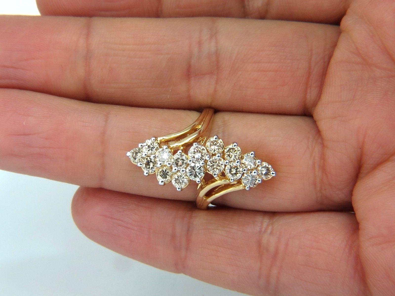 Rounds Cluster cocktail Prime.

2.00cts Natural diamonds Ring.

Full cut Brilliants

Vs-2  clarity / Fancy Light Brown Color.

14kt. yellow gold

8.1 grams.

current ring size: 8

May be resized, please inquire. 

Deck of ring: 1.1 x .40