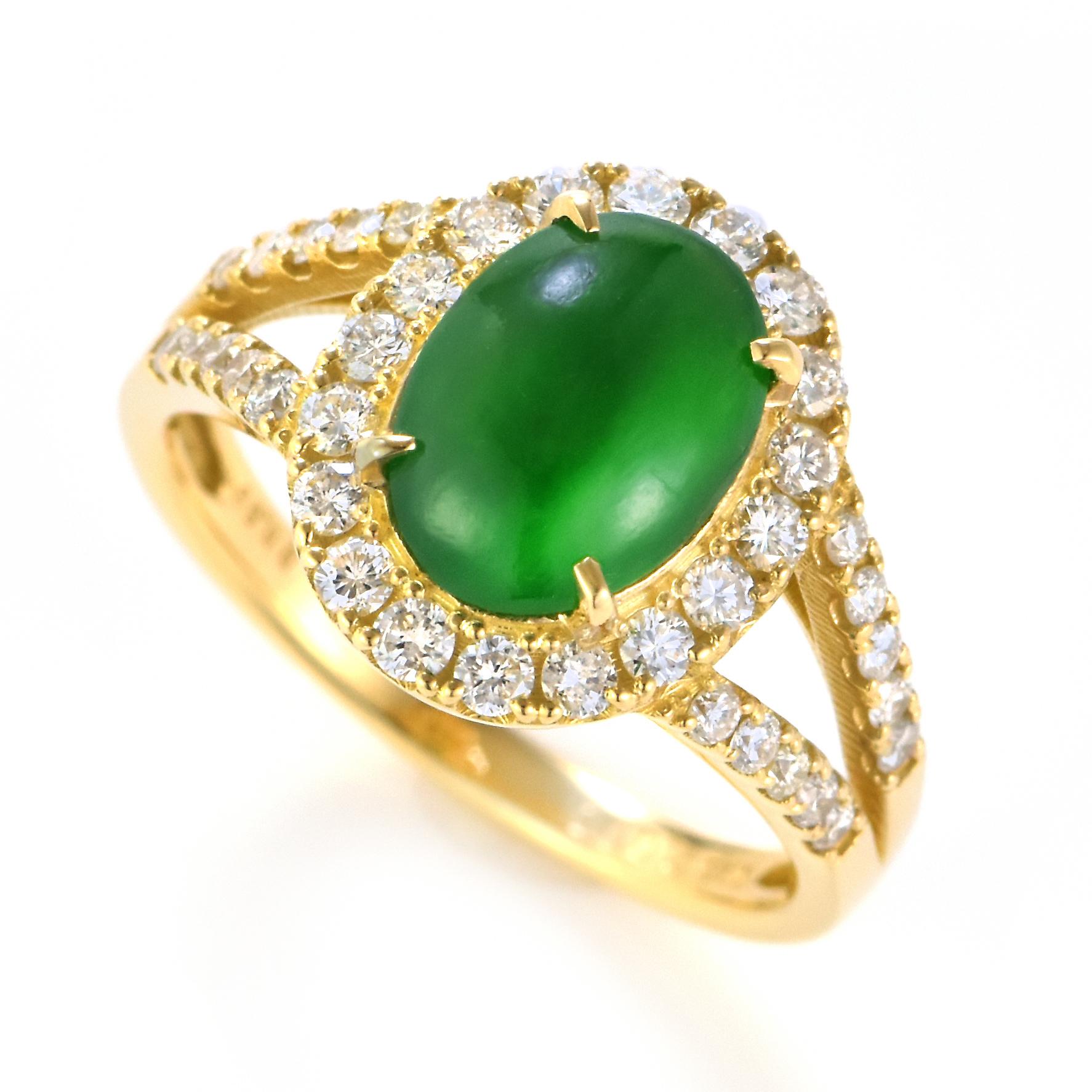A beautiful Ring featuring a 2.00 Carat, Natural, Non-dyed Jadeite and 0.59 Carats of Diamond Accents set in 18 Karat Gold. Jadeite has been cherished for millennia. Its nature is pure and enduring, yet sensuous and luxurious. Jadeite’s exceptional