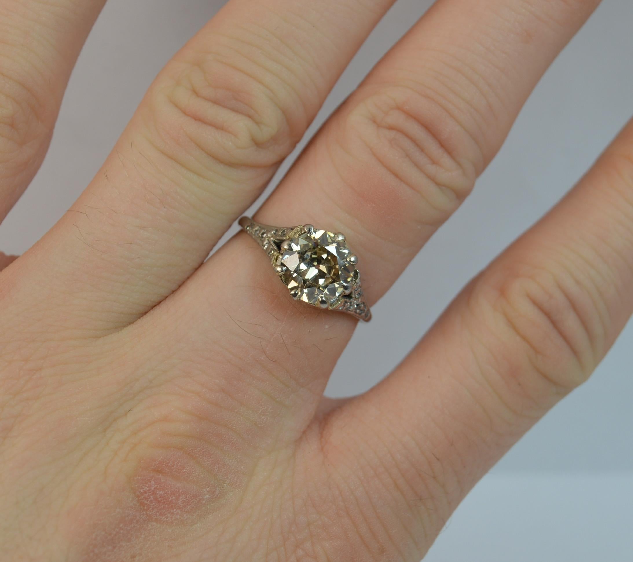 
A stunning 18ct gold and diamond solitaire ring c1910.

A solid 18 carat white gold example.

​Set with a natural old European cut diamond to the centre in claw setting. Approx 7.9mm diameter diamond to spread 2.00 carats.

The split shoulders are