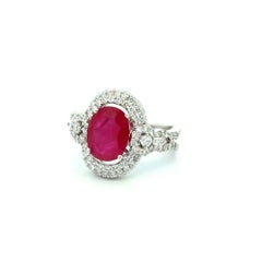 Bague vintage en or avec rubis ovale de 2,00 carats et diamants baguette et RBC