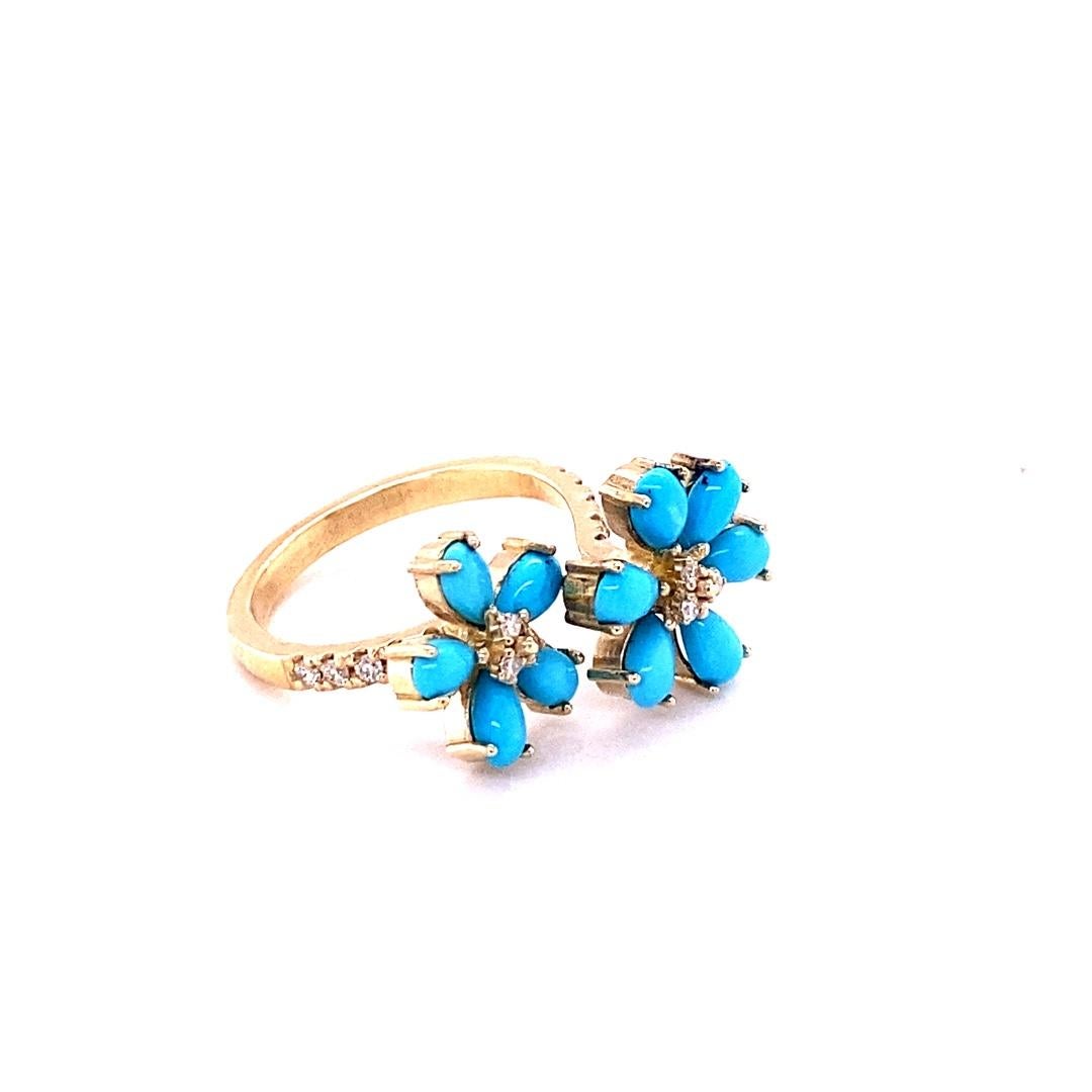 2.00 Carat Pear Cut Turquoise Diamond Yellow Gold Cocktail Ring

Flower~Power is what we like to call this beauty!!
This ring has 11 Pear Cut Turquoise stones that weigh a total of 1.78 Carats and is embellished with 17 Round Cut Diamonds that weigh