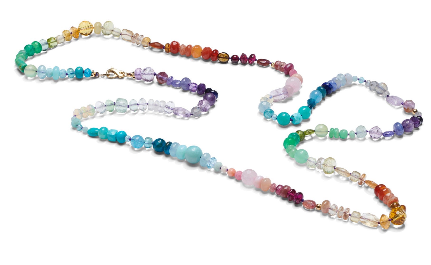 Drench yourself in an endless sprakling rainbow. This extra long precious necklace can be wrapped around your neck twice. This handmade necklace enriched with the following gemstones such as;

• Sapphires
• Swiss topaz
• Ethiopian Welo opal
• Afghan