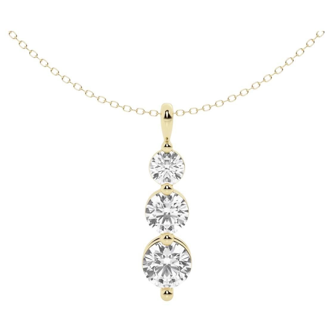 This impressive three-stone round diamond pendant is finely crafted in brightly polished 14 karat yellow gold and features three stones totaling a carat weight of 2.00CTW. These diamonds are SI clarity. Ideal as an anniversary or birthday present,