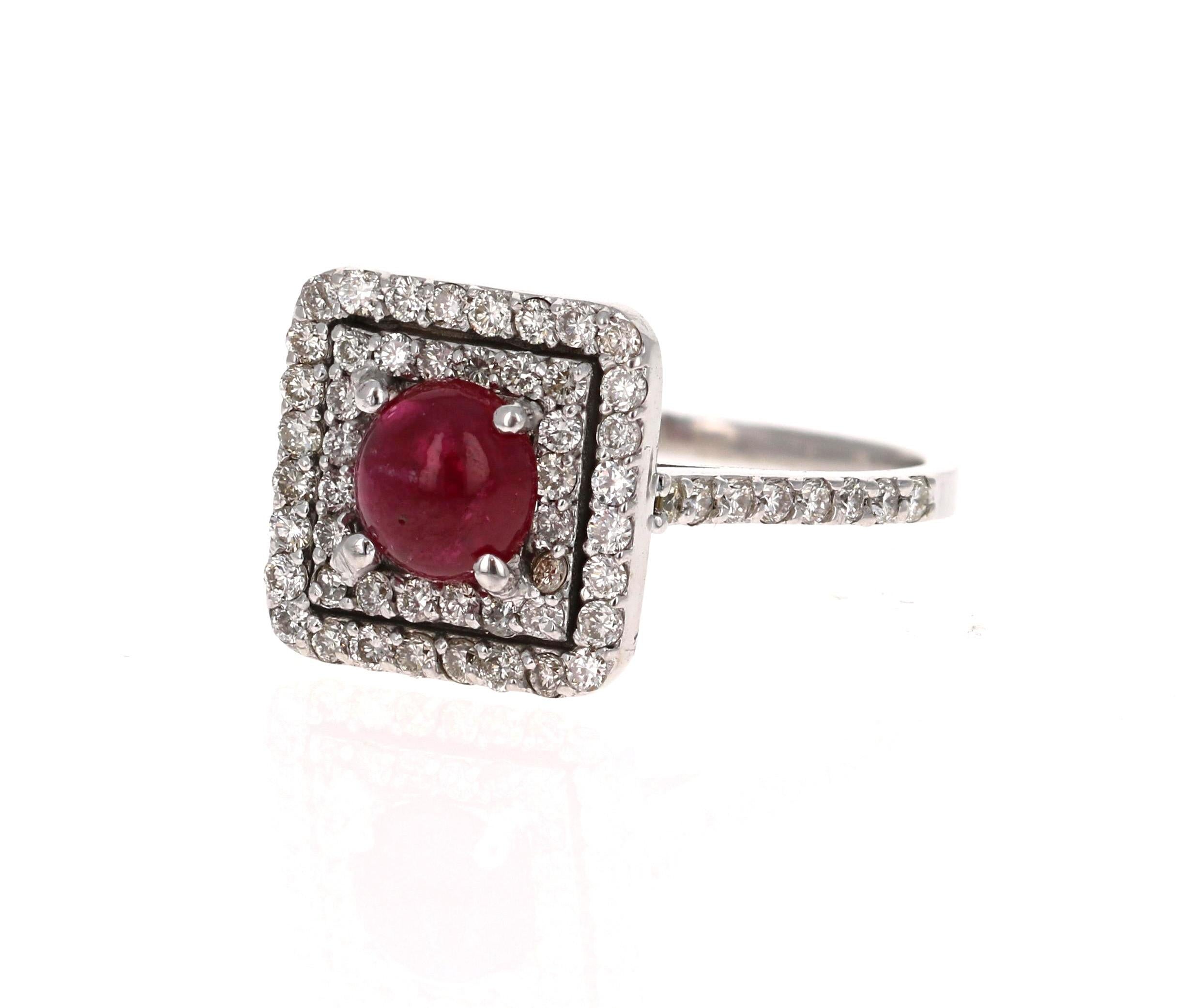 A cute and elegant Ruby Ring that can be a promise or engagement ring!
2.00 Carat Ruby Diamond White Gold 14 Karat Halo Ring

A Round Cut Ruby Cabochon weighing 1.22 Carats is surrounded by a double halo of 64 Round Cut Diamonds that weigh 0.78