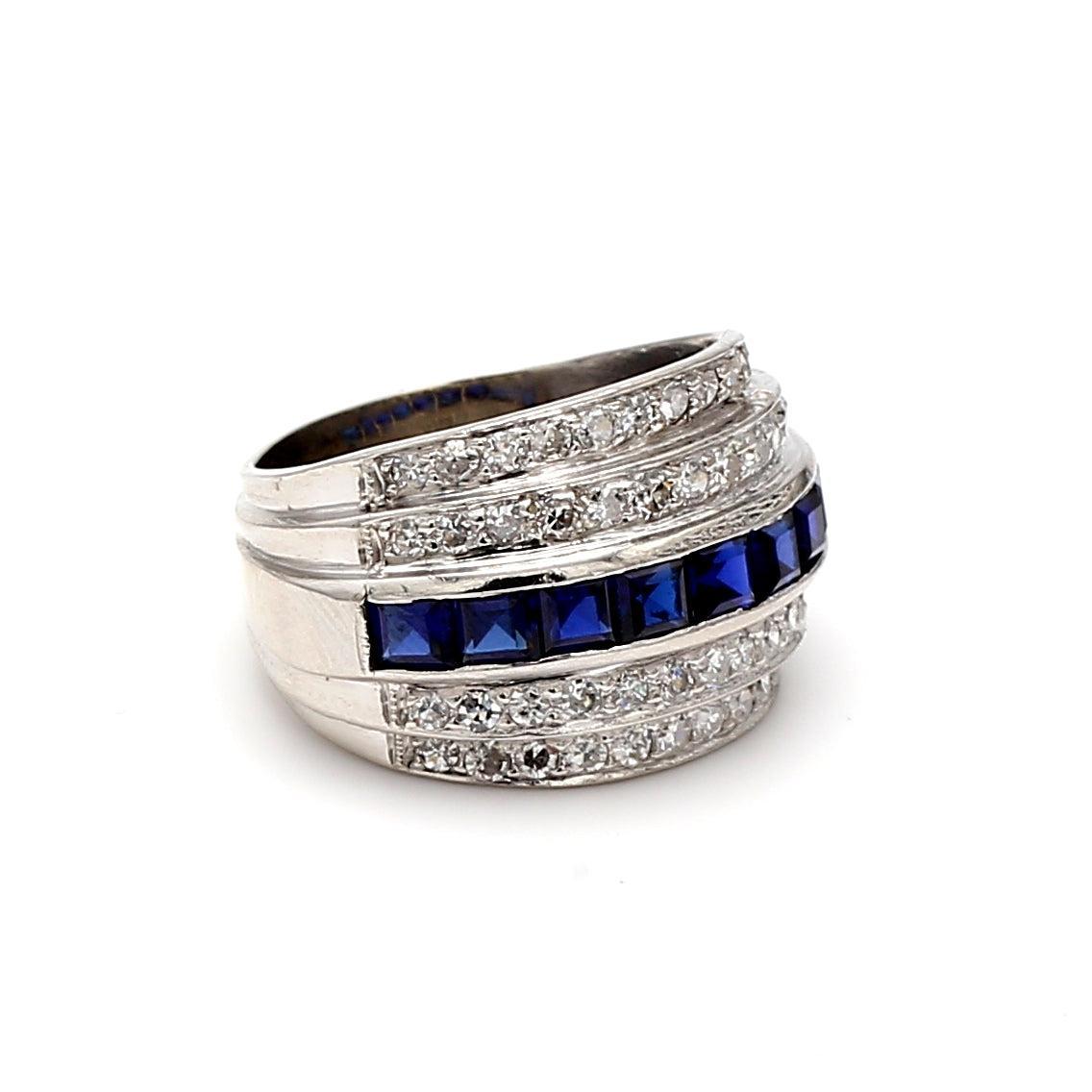 Titre :
2.00 Carat Princess Cut Sapphire 0.61 Carat Round Brilliant Diamond Platinum Band Ring


Le style :
Bande


Métal :
Platine


Pierre précieuse 1 :
2 Carat Saph


Nombre de pierres :
9


Forme :
Coupe princesse


Pierre précieuse 2 :
Diamant