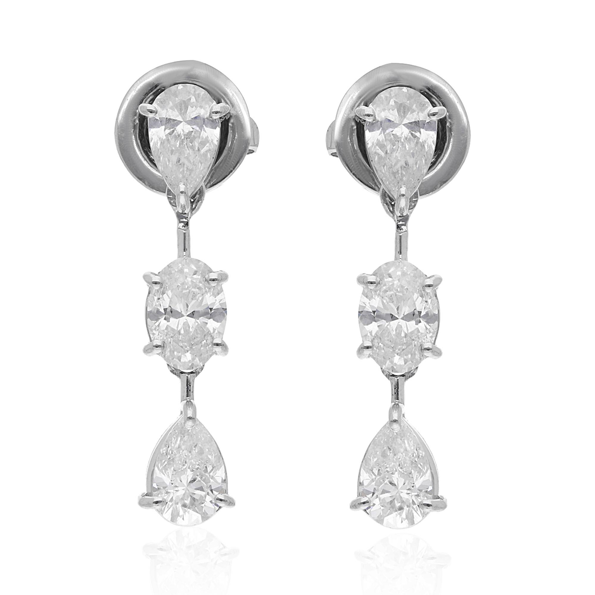 Crafted with precision and attention to detail, the earrings feature a sleek and modern design that exudes sophistication. The 14 Karat White Gold setting provides the perfect complement to the dazzling diamonds, with its polished finish and
