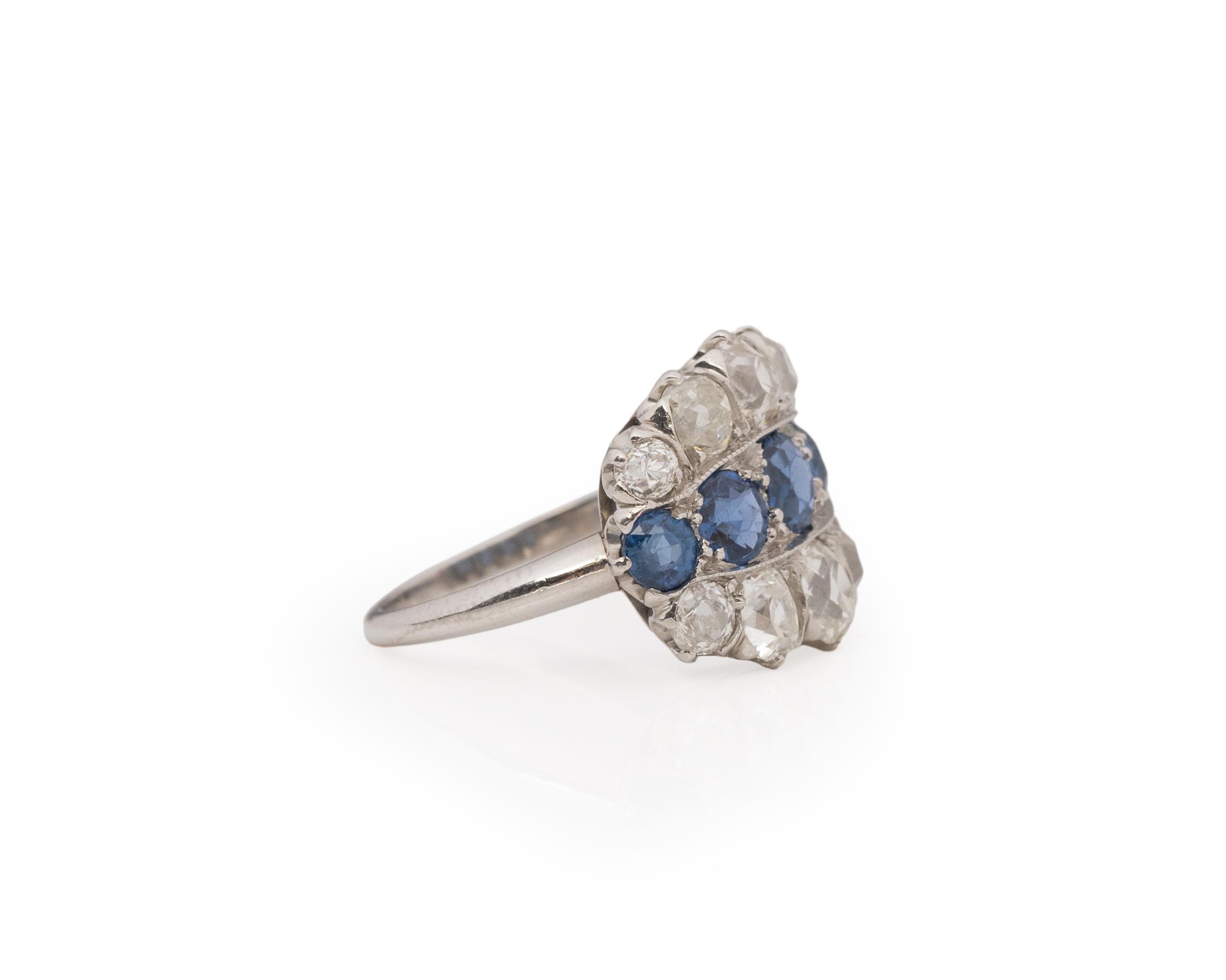 Ring Size: 6
Metal Type: Platinum [Hallmarked, and Tested]
Weight: 6.4 grams

Diamond Details:
Weight: 2.00ct, total weight
Cut: Old Mine brilliant
Color: H-I
Clarity: VS-SI

Sapphire Details:
Natural, Unheated. Blue.
1.50ct, total weight

Finger to