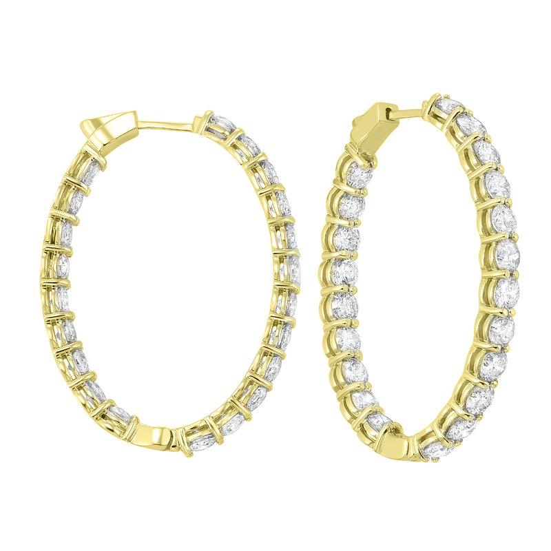 Nothing says luxury like an incredible pair of diamond oval hoop earrings. These stunning brightly polished 14 karat yellow gold inside out round-shaped hoop earrings feature a total of 46 round brilliant cut diamonds totaling 2.00 carats are prong