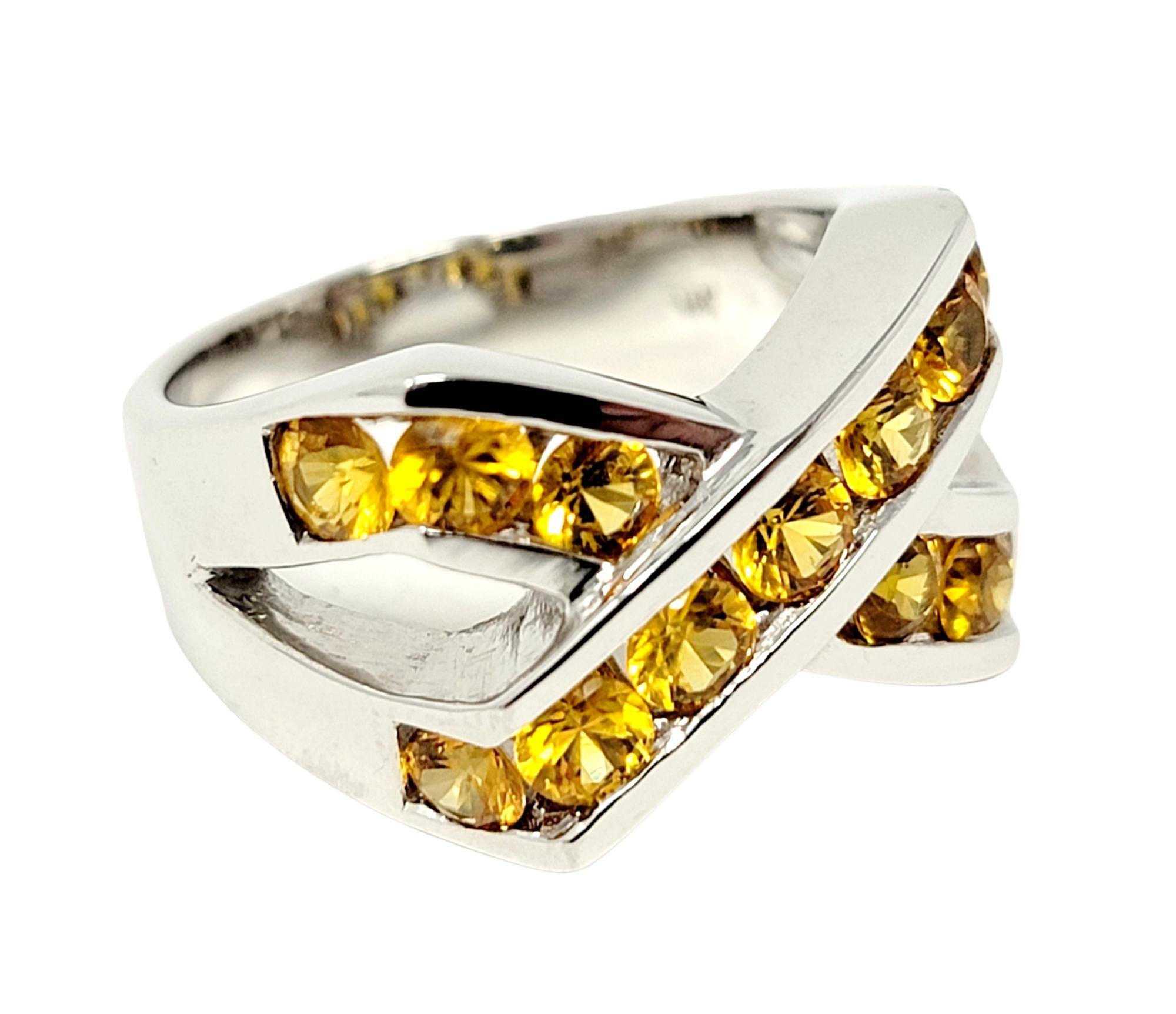 Ring size: 7.25

Beautiful contemporary sapphire band ring bursting with bold color and sparkle. 

Ring Type: Band
Ring size: 7.25
Metal: 14K White Gold
Weight: 9.4 grams
Natural Sapphires: 2.00 ctw 
Stone cut: Round
Stone color: Yellow
Band Width: