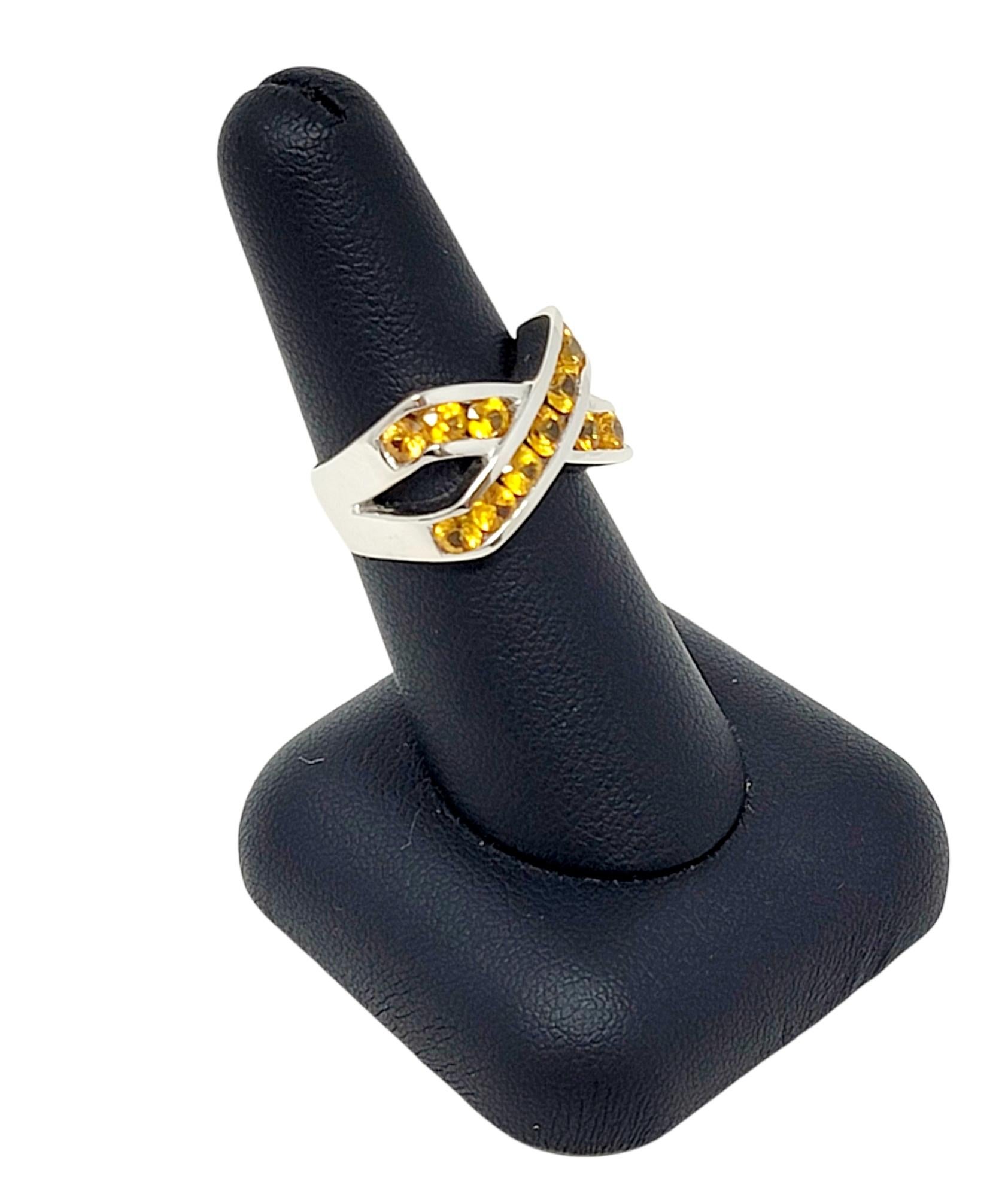 2.00 Carat Total Yellow Sapphire Channel Set Crossover X Band Ring 14 Karat Gold In Good Condition For Sale In Scottsdale, AZ