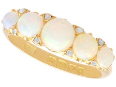 Opale bianco da 2,00 carati e diamante da 0,16 carati in oro giallo 18k - Anello con cinque pietre (1905)
