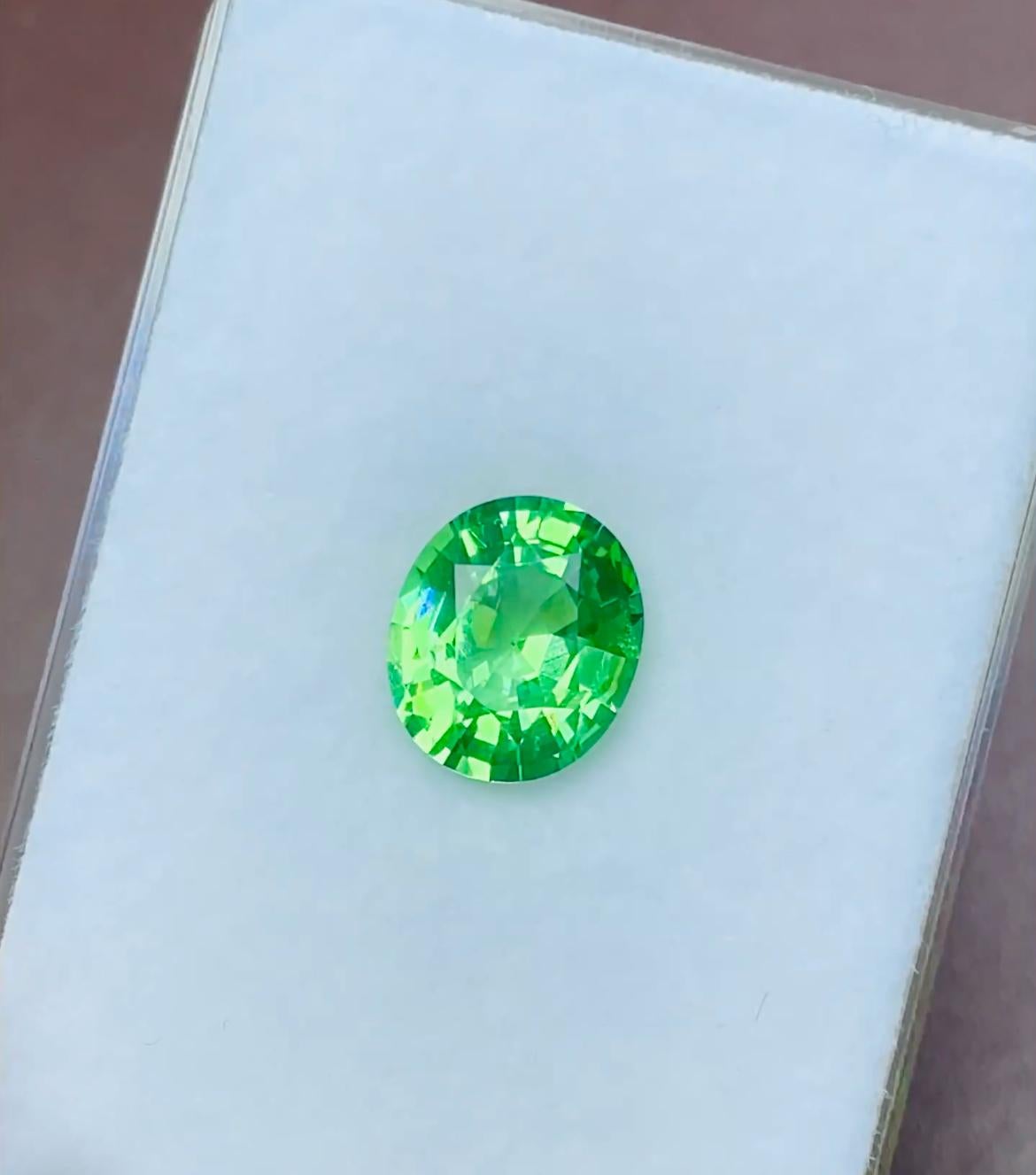 Tsavorite mint green vibrant color perfect cutting luster High quality mint green Germany cut 

Name: Tsavorite
Weight: 4.26carats
Origin: Africa
Color: vivid green
Clarity:clean
Shape:oval
Size: 10.9*9.3 mm
Treatment : Natural 
Certificate: -