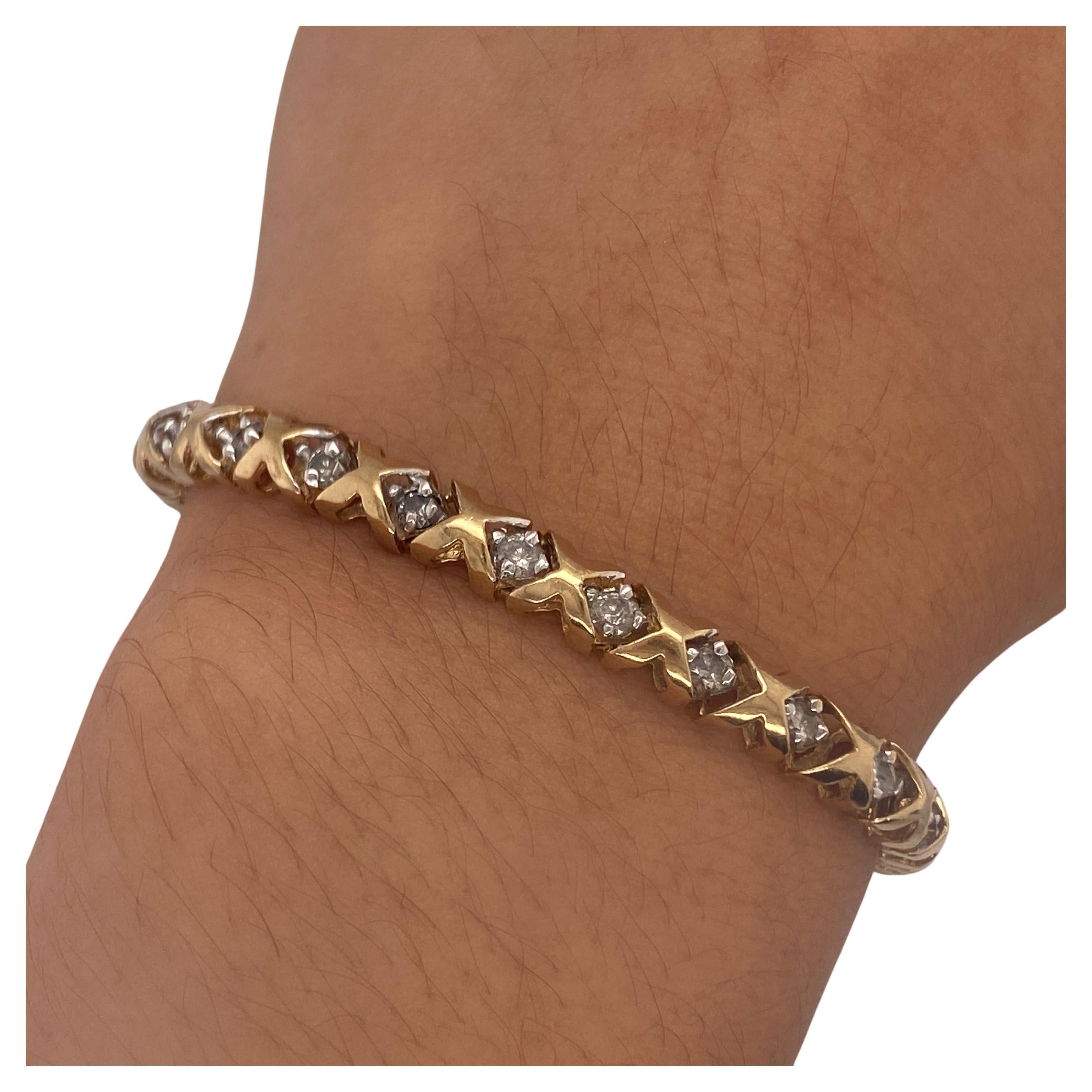 Grace your wrist with this supple and fluid link bracelet featuring 2.00 carats total weight of round brilliant cut diamonds. The design of the bracelet is made with the best shorthand for love and hugs and kisses: a repeating XOXOXO pattern. Each