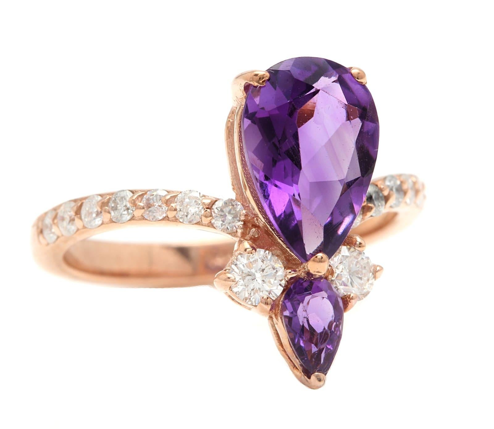 2.00 Carats Natural  Impressive Amethyst and Diamond 14K Rose Gold Ring

Suggested Replacement Value $3,500.00

Total Natural Amethysts Weight: Approx. 1.70 Carats

Center Amethyst Measures: Approx. 10 x 7mm

Natural Round Diamonds Weight: Approx.