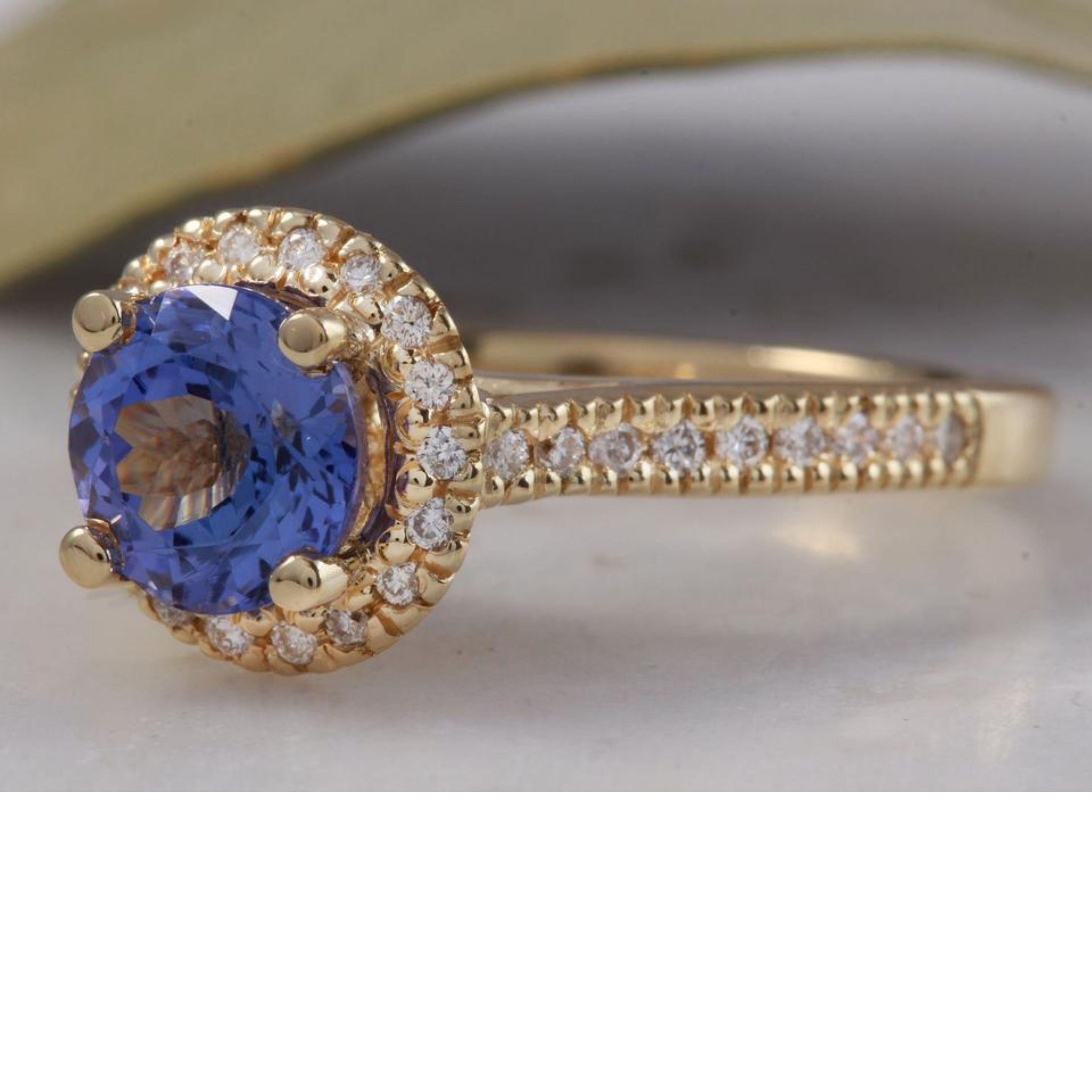 2.00 Carats Natural Impressive Tanzanite and Diamond 14K Solid Yellow Gold Ring

Total Tanzanite Weight is: 1.55 Carats

Tanzanite Measures: 7mm

Natural Round Diamonds Weight: 0.45 Carats (color G-H / Clarity SI1-SI2)

Ring size: 7 (we offer free
