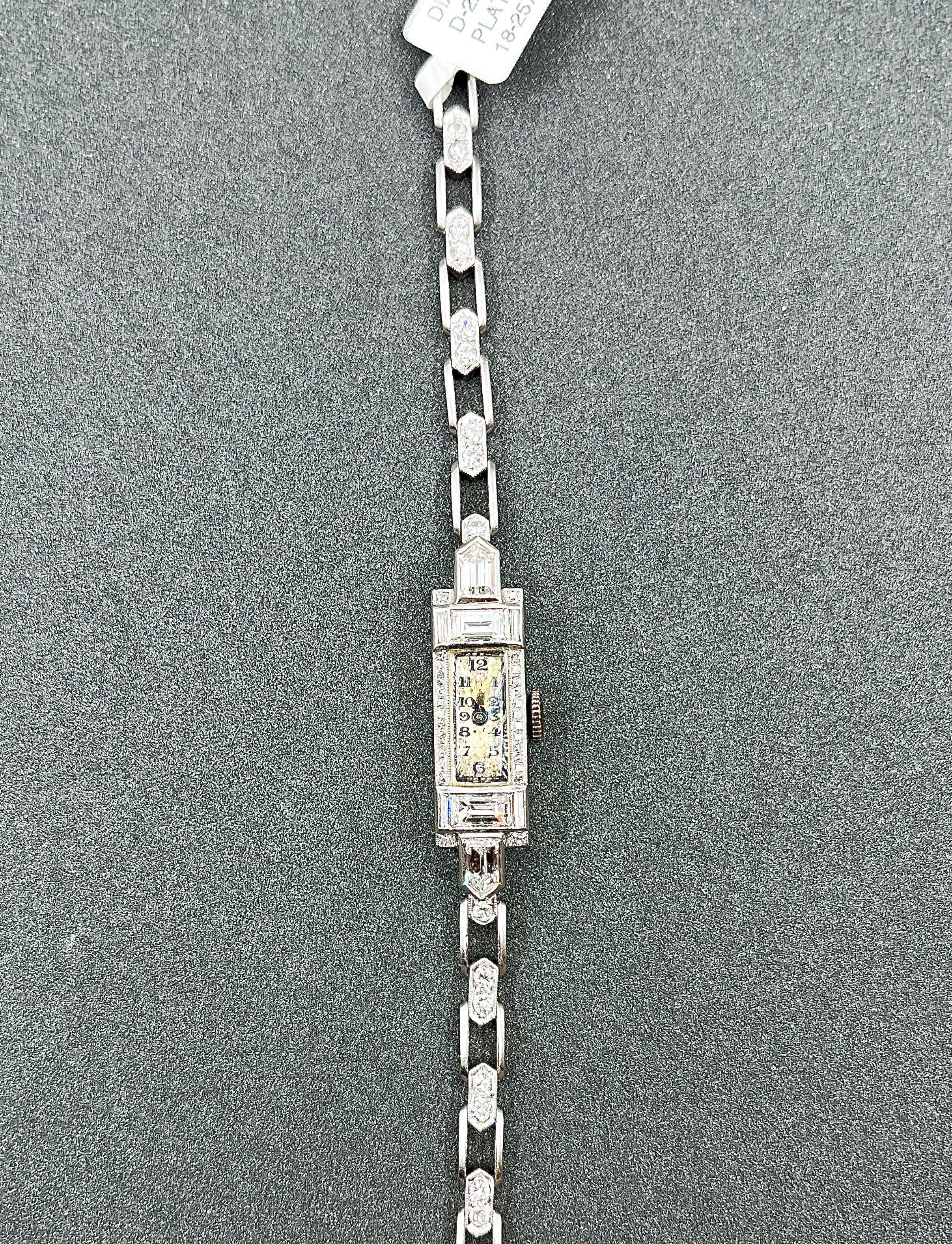 This elegant Art Deco watch is a remarkable piece for any collection. Featuring a rectangular shape, it showcases approximately 2.0 carats of mixed-cut diamonds. The diamonds are white in color, with an F/G color grade and VS2/SI1 clarity. Crafted