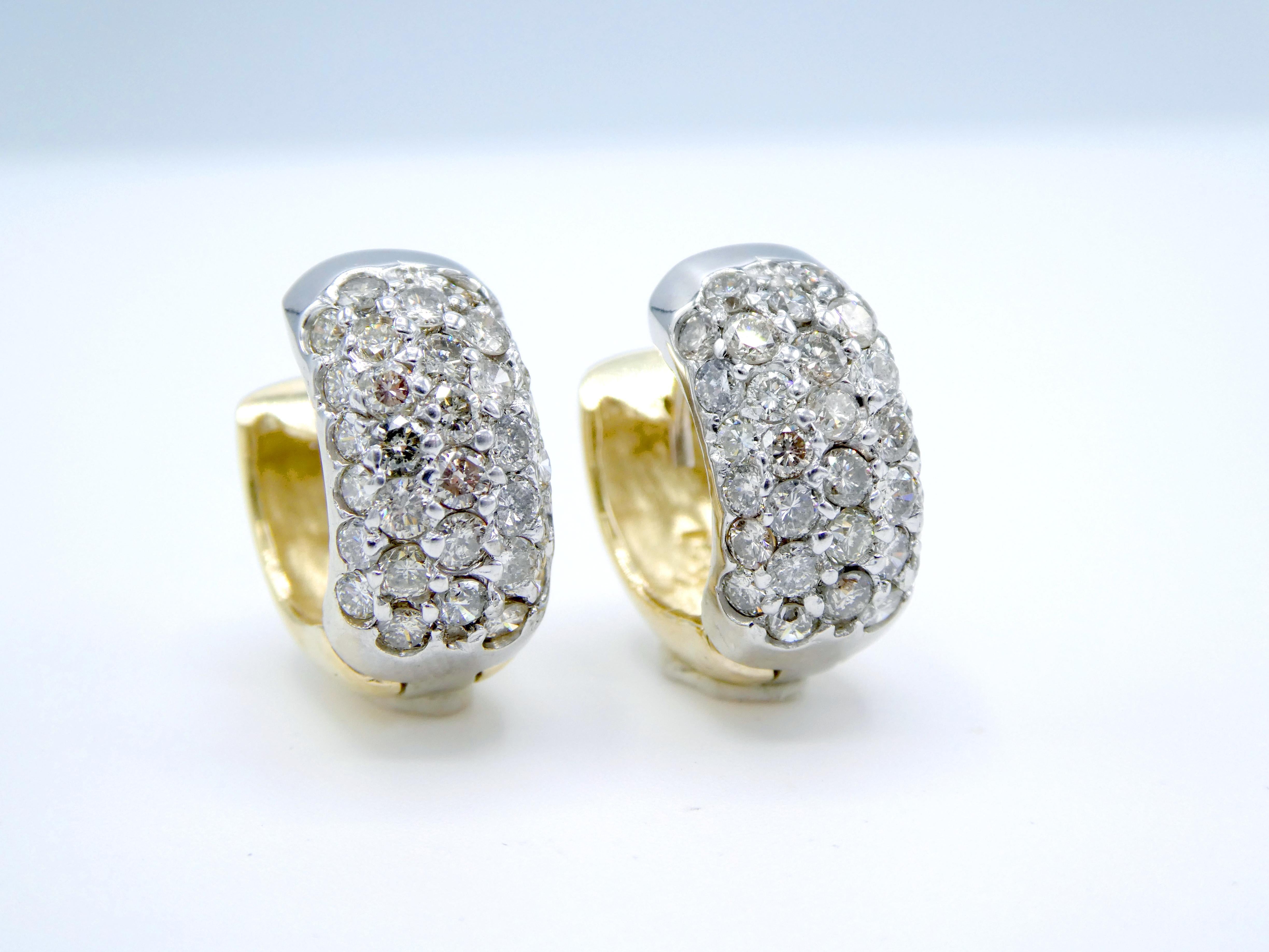 2.00 CTW 14K Gold Diamond Pave Mini Hoop Huggie Earrings

Metal: 14k Two-Tone Gold
Weight: 8.16 grams
Diamonds: approx. 2.00 CTW J-K SI
Diameter: 16.20mm
Width: 8mm