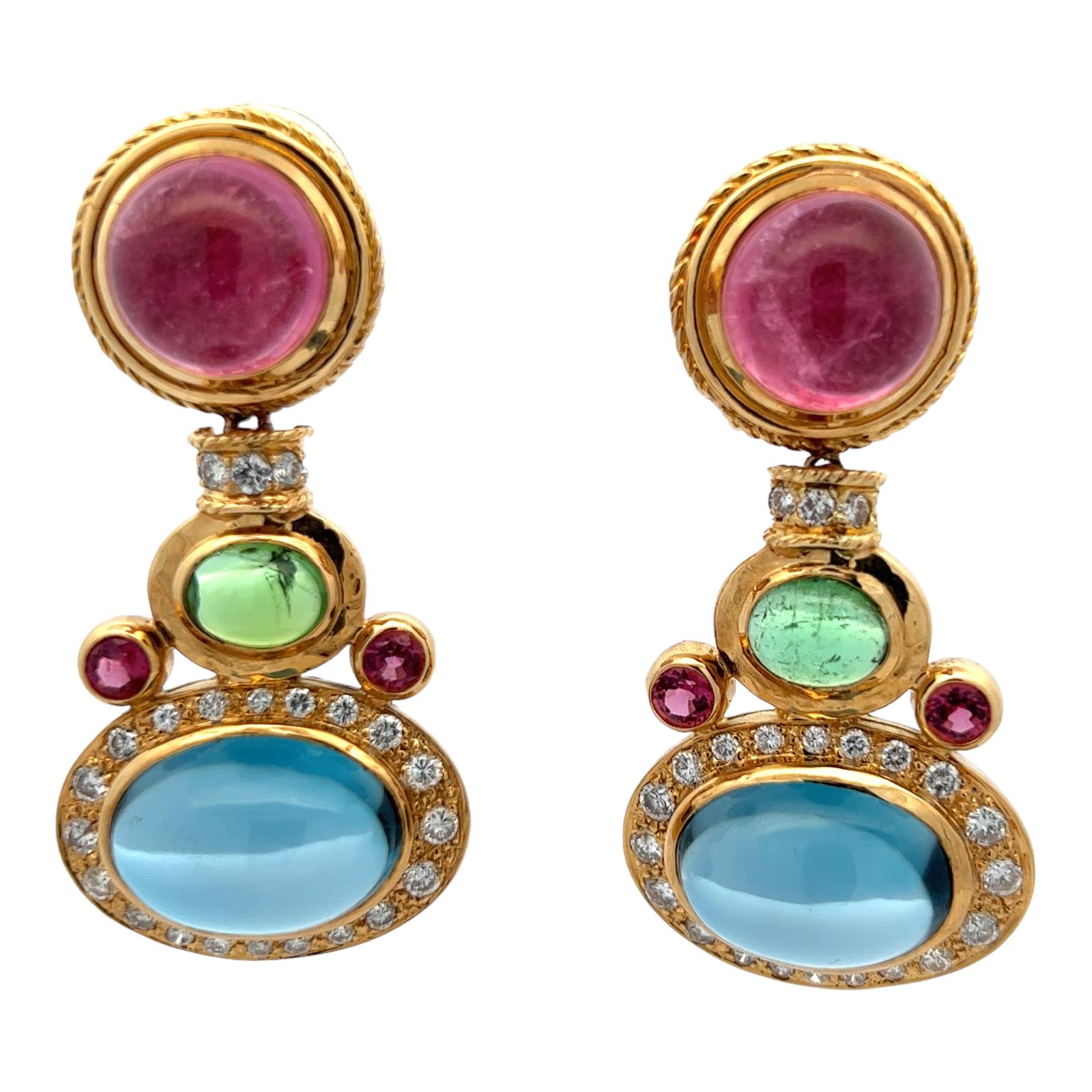 Stunning diamond and cabochon gemstone drop earrings handcrafted in 18 karat yellow gold. The earrings feature round brilliant cut diamonds weighing approximately 2.00 CTW and graded G-H color and VS2-SI1 clarity. Cabochon pink and green tourmaline,