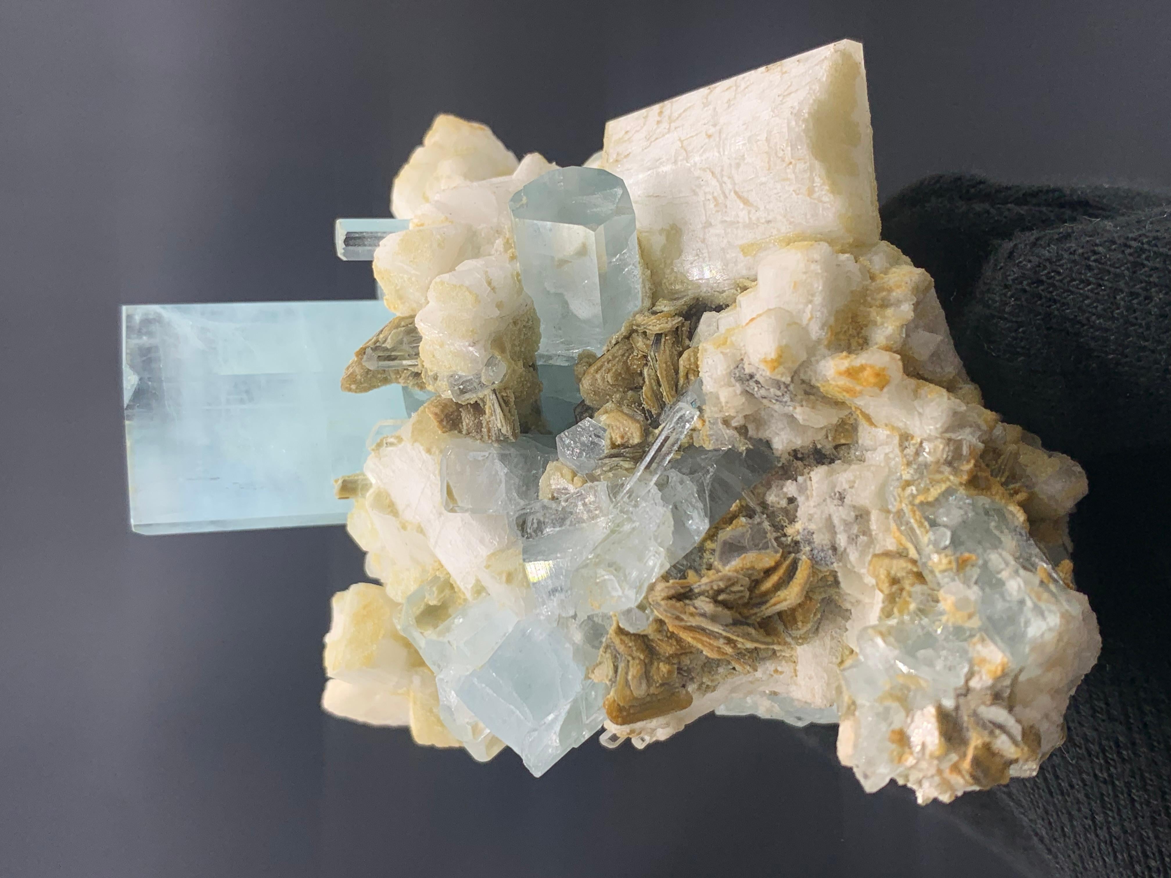 Weight: 200 Gram 
Dimension: 8.1 x 6.6 x 6.8 Cm
Origin: Skardu Valley, Pakistan 

Aquamarine is a pale-blue to light-green variety of beryl. The color of aquamarine can be changed by heat. Aquamarine has a chemical composition of Be₃Al₂Si₆O₁₈, also