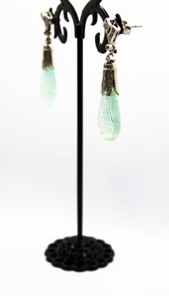 20.00 Carat Carved Aquamarine 0.60 Carat White Diamond White Gold Stud Earrings