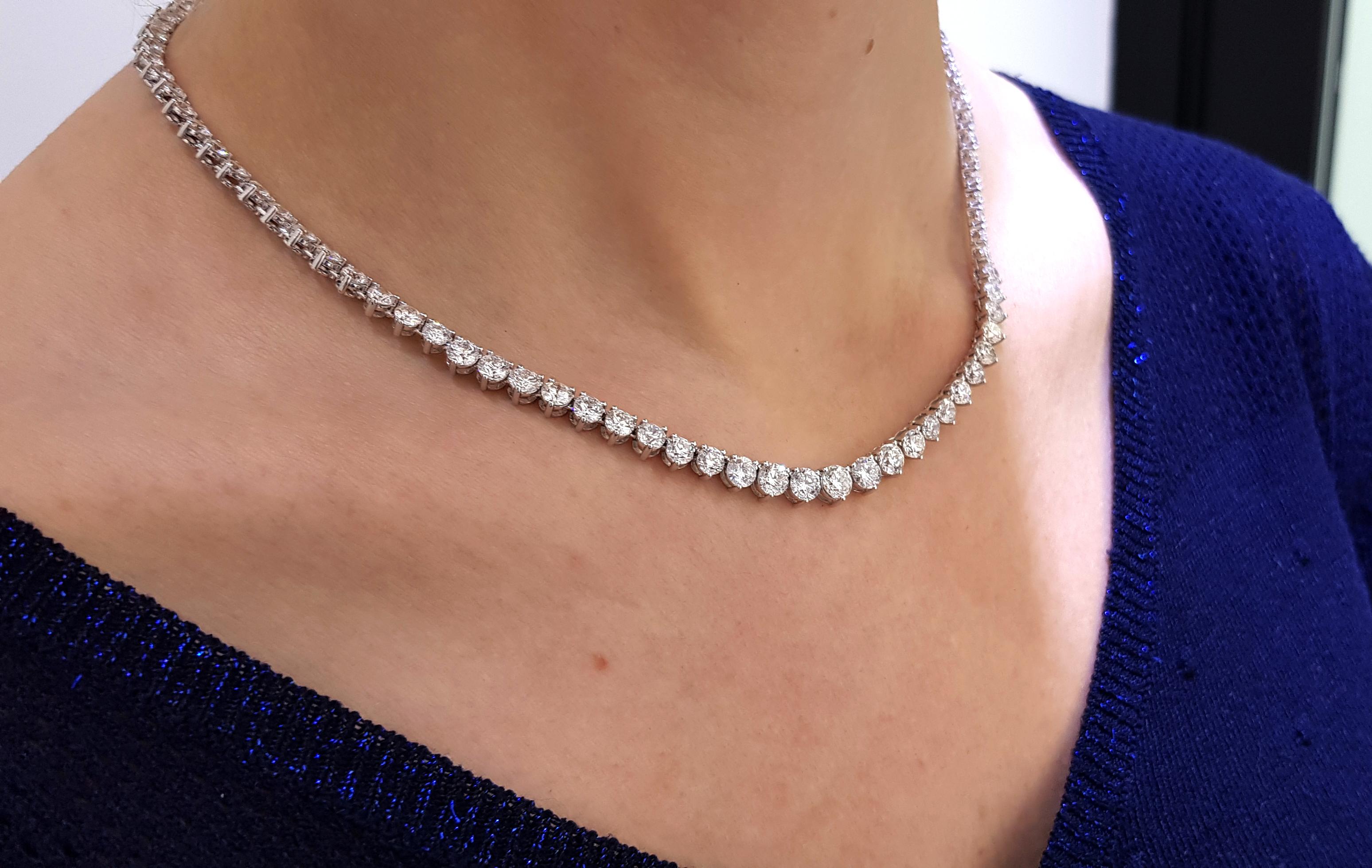 This stunning and impressive Riviera Necklace features substantial Diamond weight of 20.00 Carats in beautifully graduated Round Brilliant Cut gems with a sparkly white color H/I clarity SI1. Each stone has a three claw setting with open gallery and
