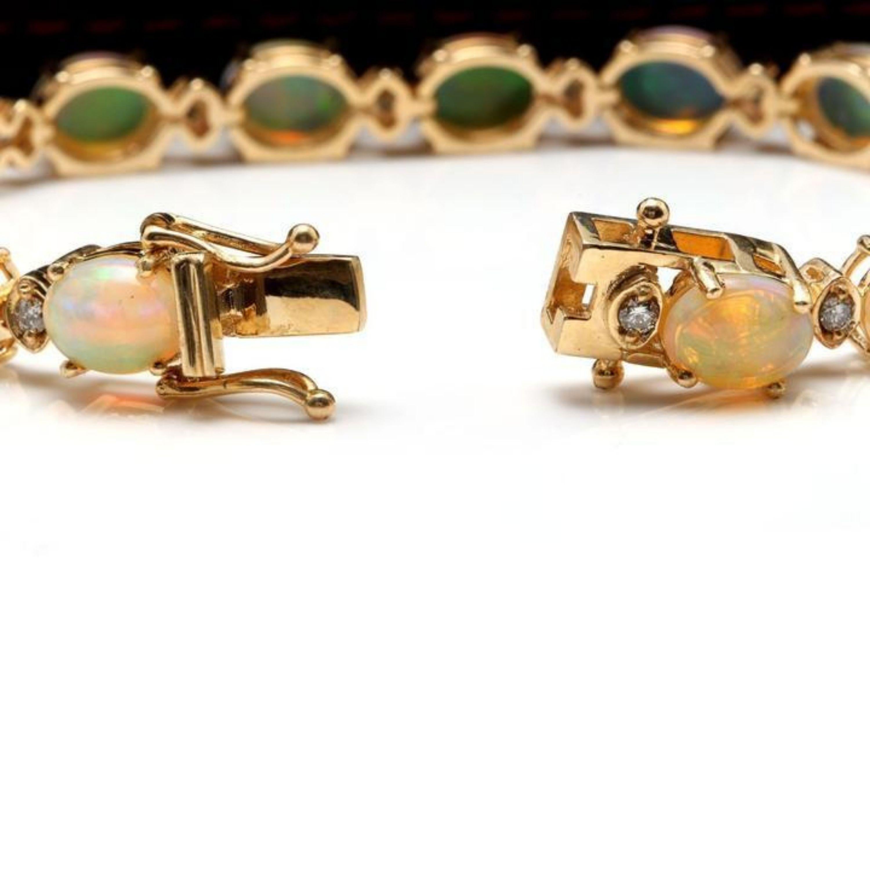 Very Impressive 20.00 Carats Natural Ethiopian Opal & Diamond 14K Solid Yellow Gold Bracelet

STAMPED: 14K

Total Natural Round Diamonds Weight: 1.10 Carats (color F-G / Clarity VS2-SI1)

Total Natural Opals Weight is: 18.90 carats

Opal Measure: 9