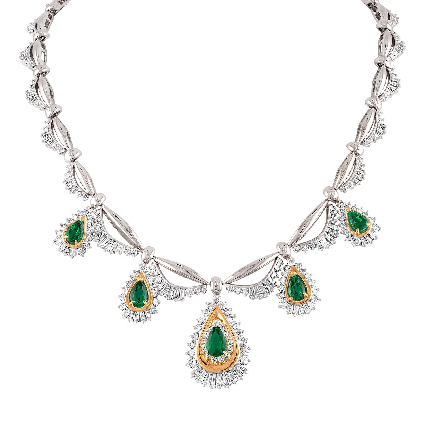 Stunning Bridal or Event Set Suite
The set consists of Earrings and Necklace
The set is 14K White & Yellow Gold

The Necklace has 16.00 Carats In Diamonds  F/G SI
There are 8.00 Carats in Zambian Emeralds
The necklace is 16